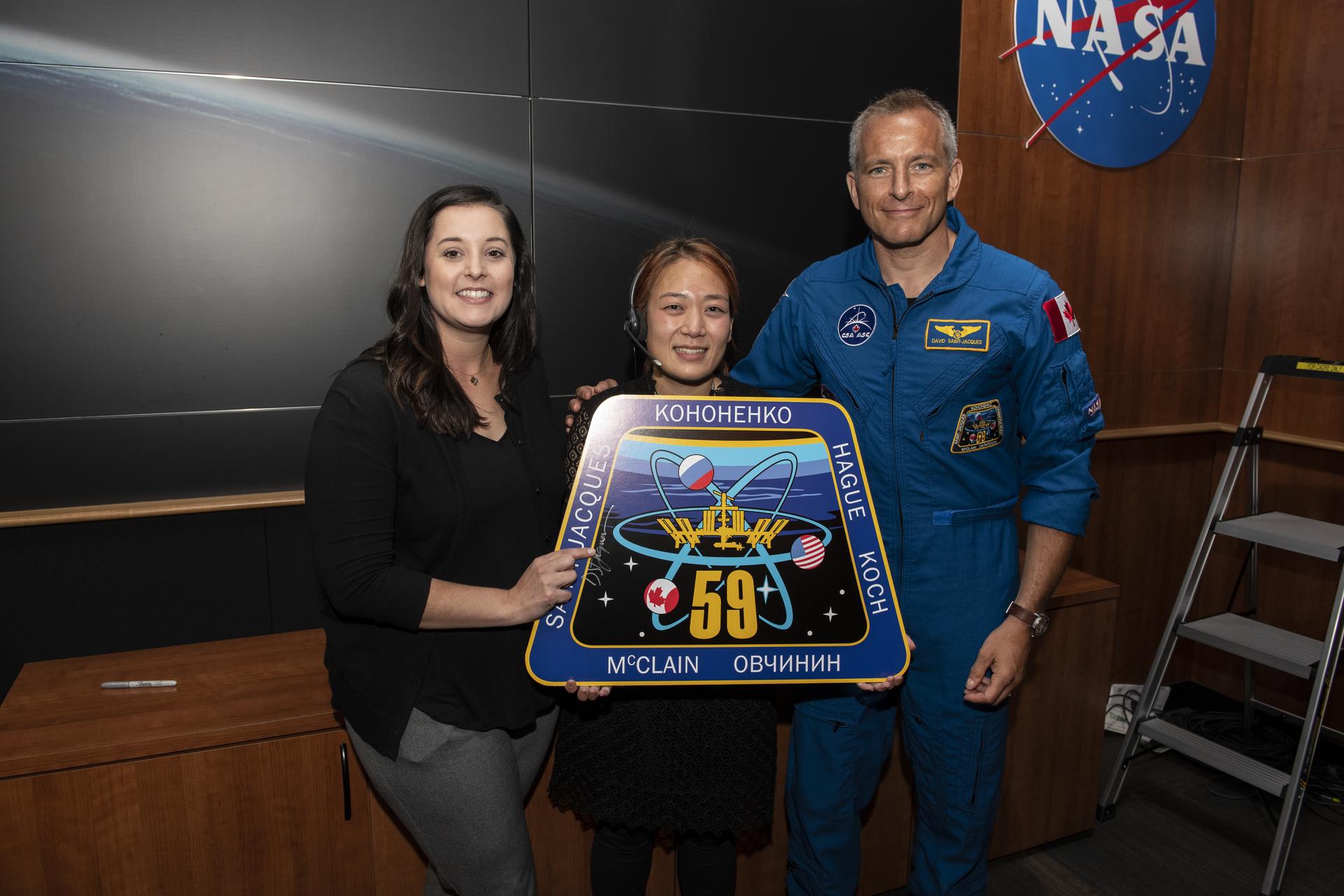 Expedition 59 Plaque Hanging In the Payload Operations Integrati