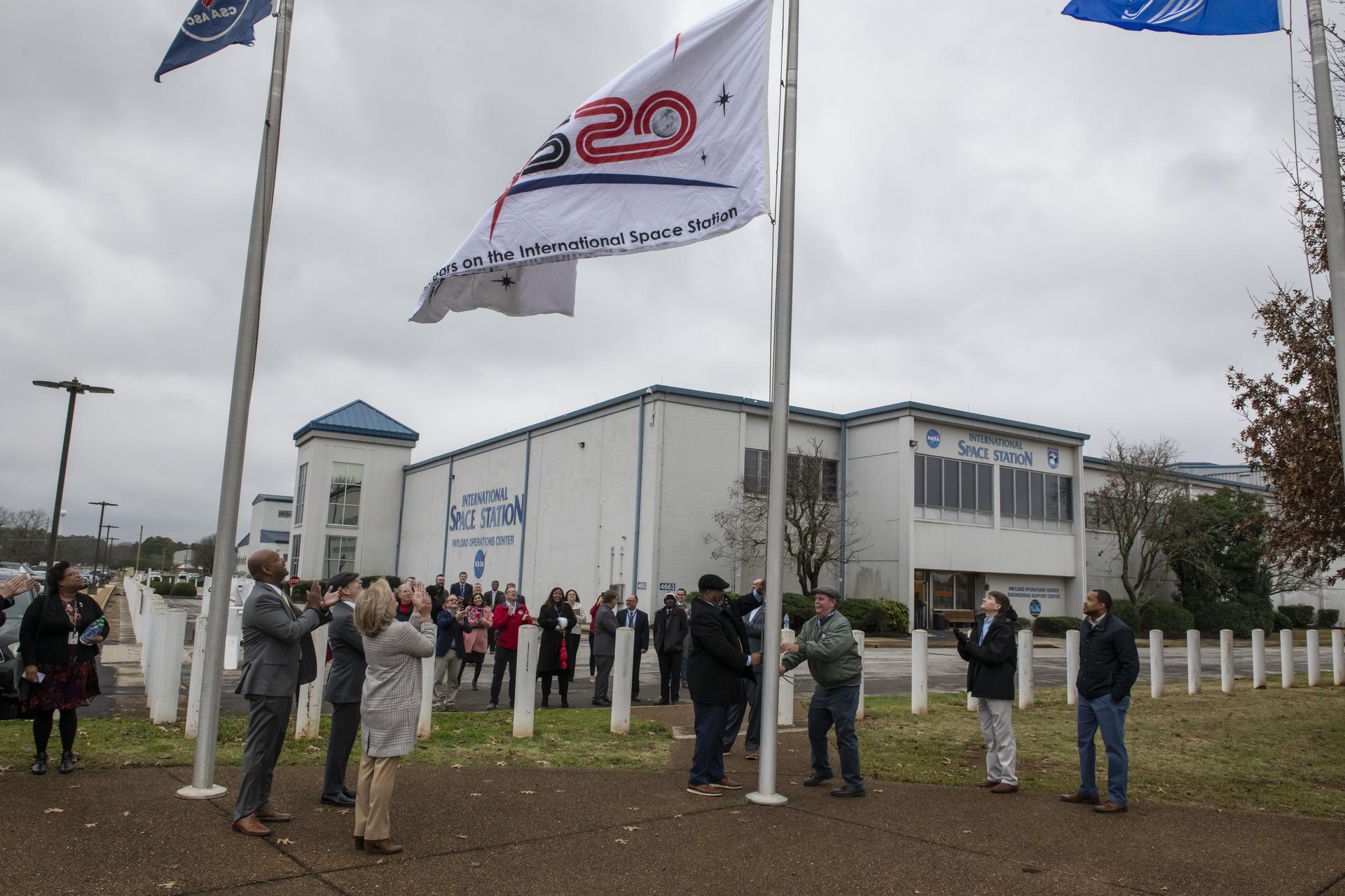 Associate Administrator Douglas Loverro Participates in the Hanging of the ISS Flag
