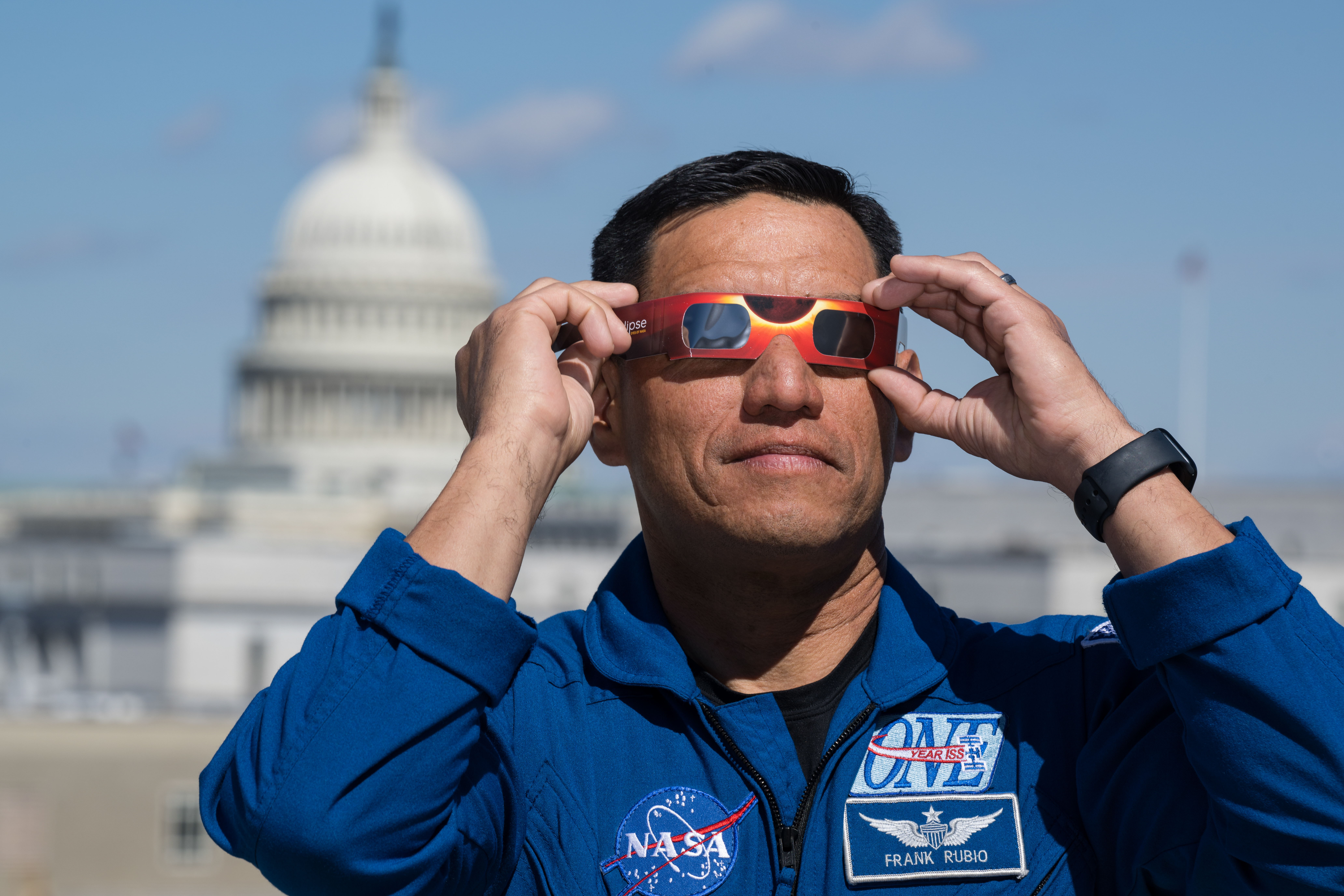 Expedition 69 Crew Wears Solar Eclipse Glasses