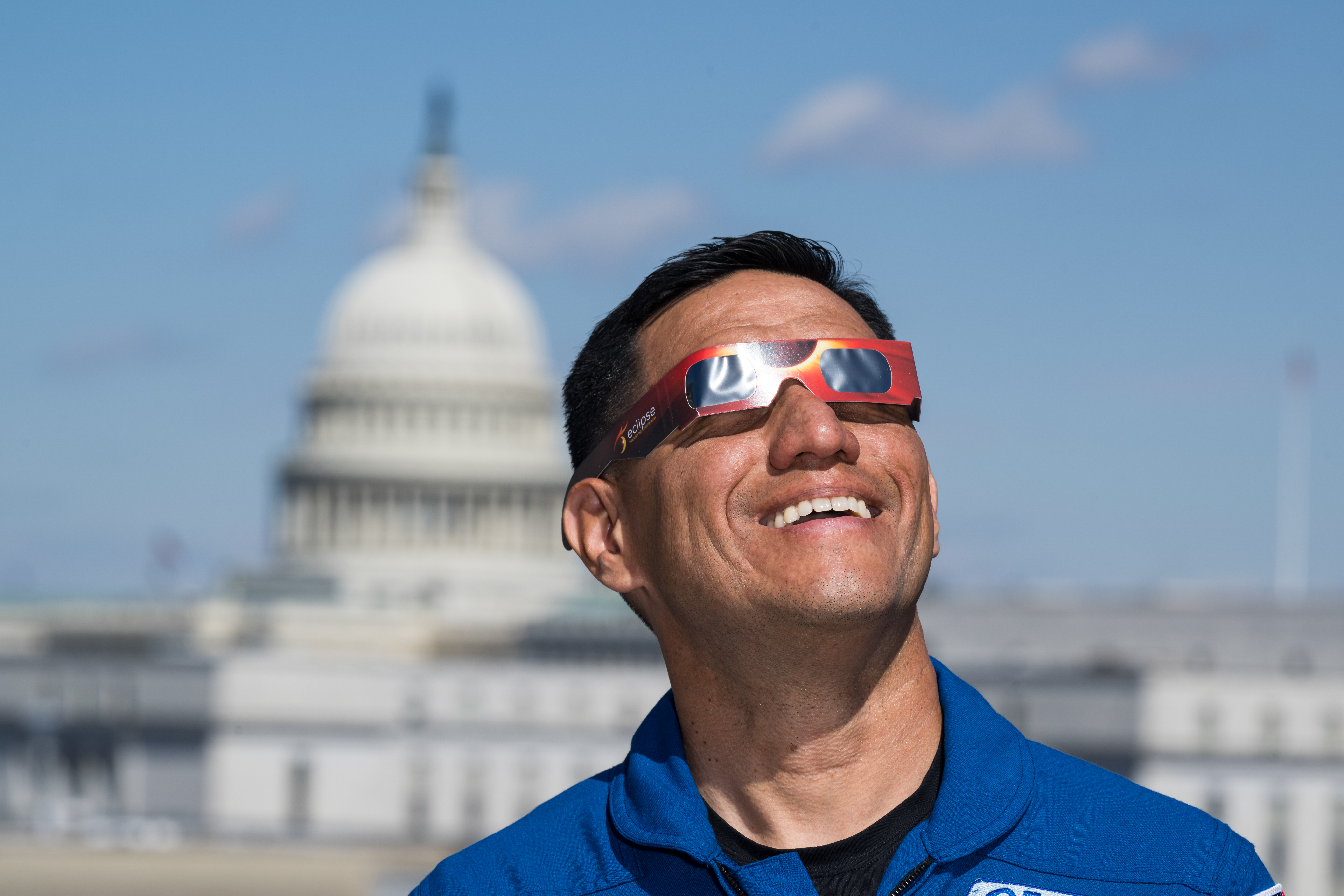 Expedition 69 Crew Wears Solar Eclipse Glasses