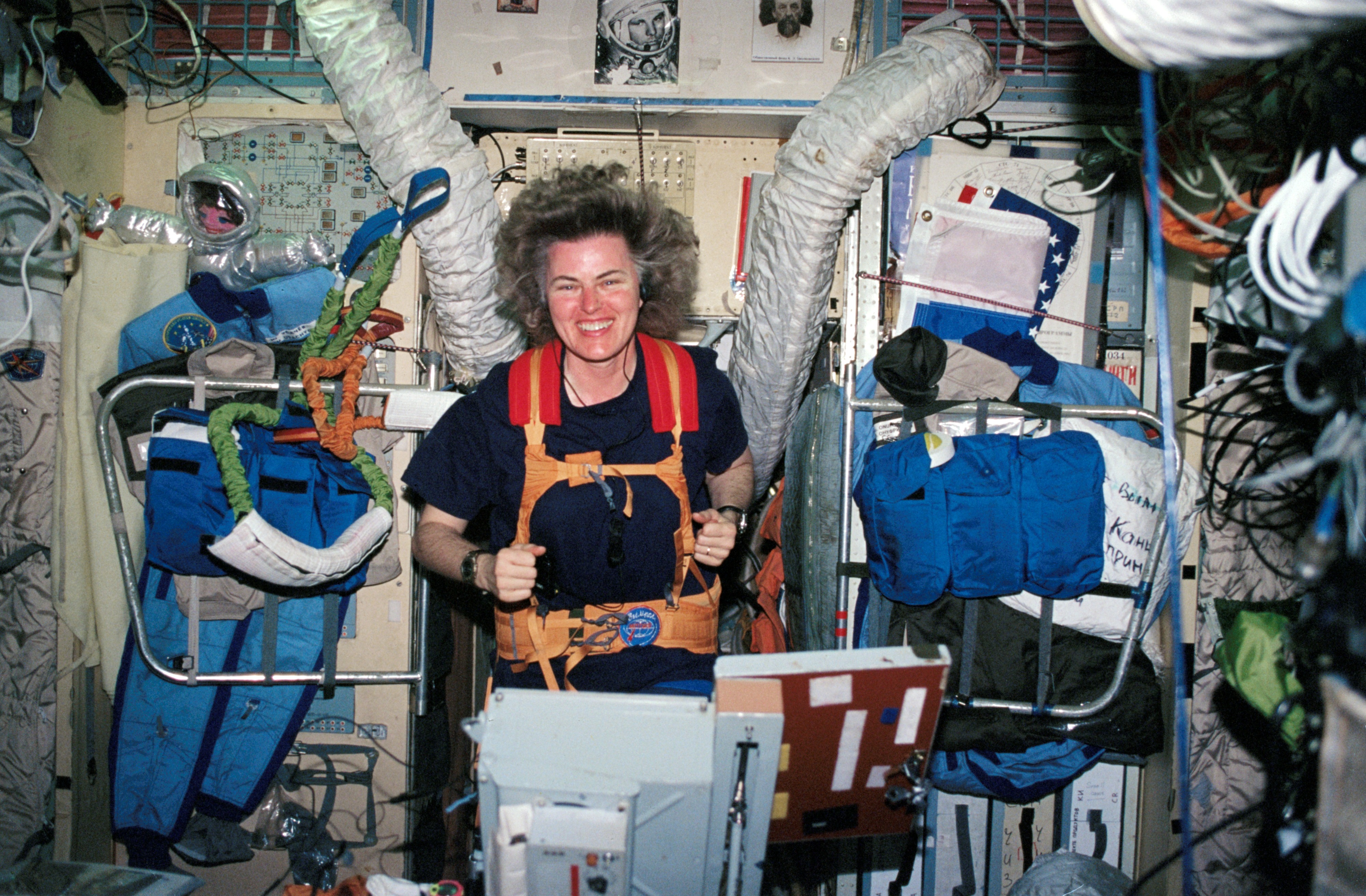 Astronaut Lucid on treadmill in the Base Block module