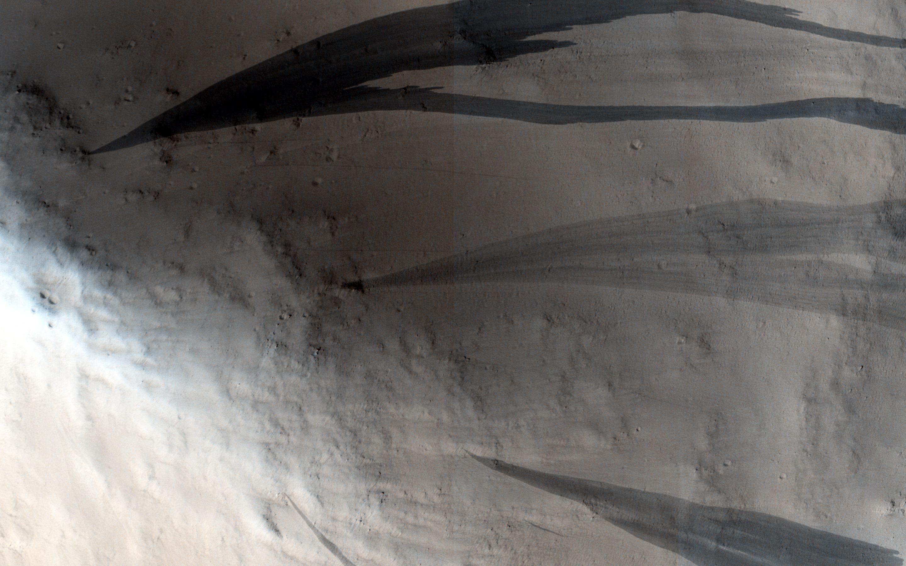 Slope Streaks on a Dusty Planet