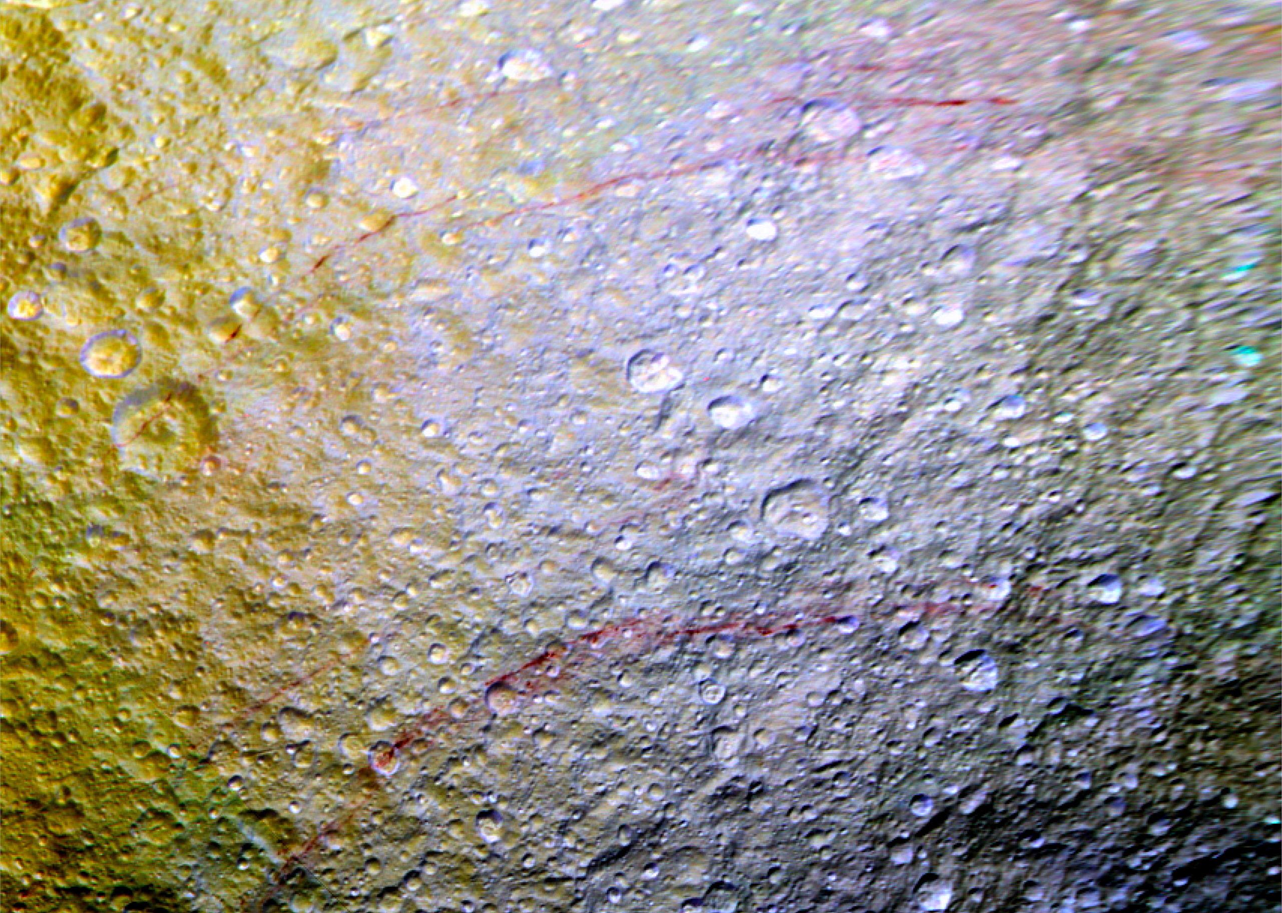 Red Arcs on Tethys