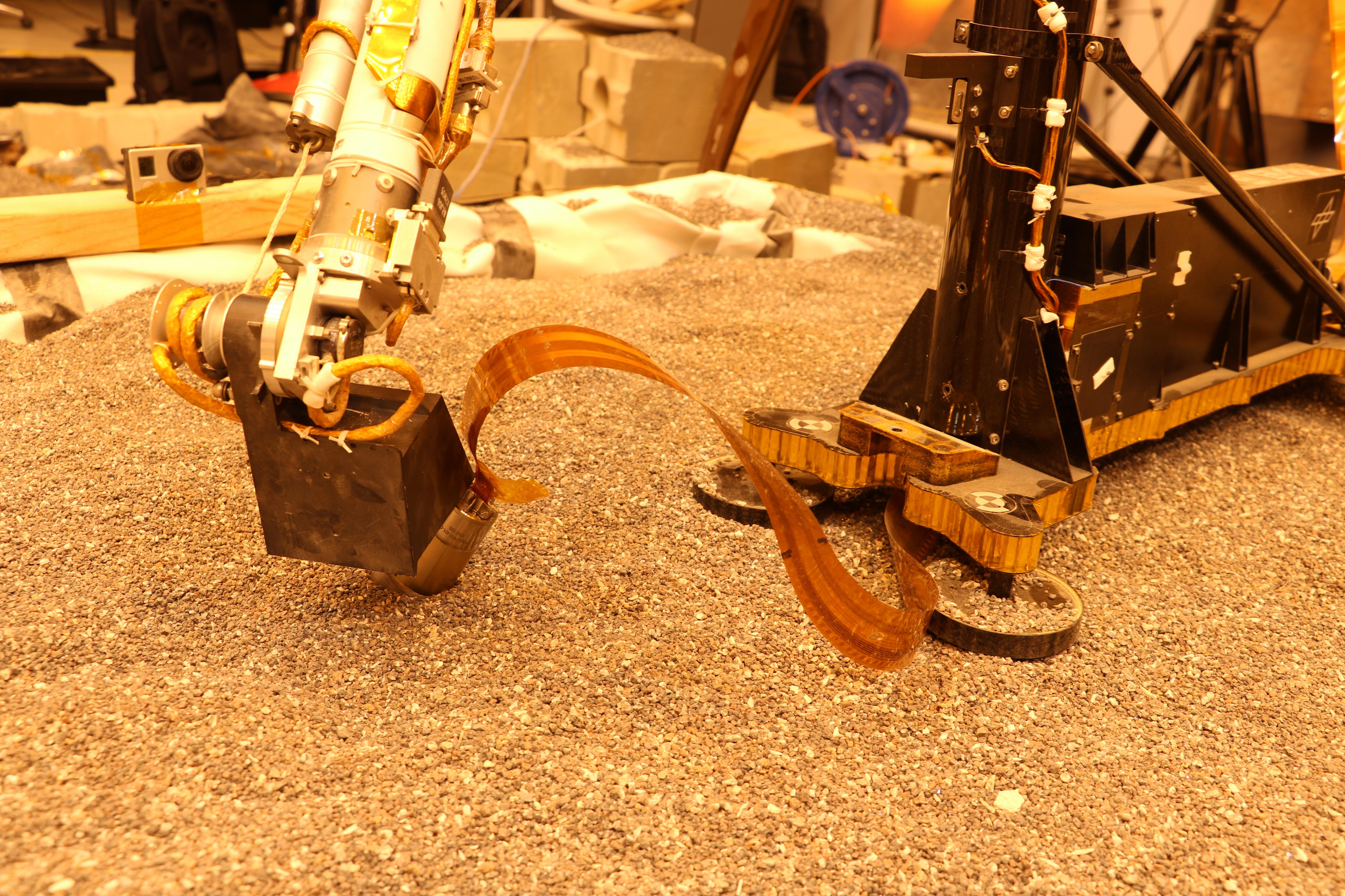 Robotic Arm Pushes on a Model of the Mole