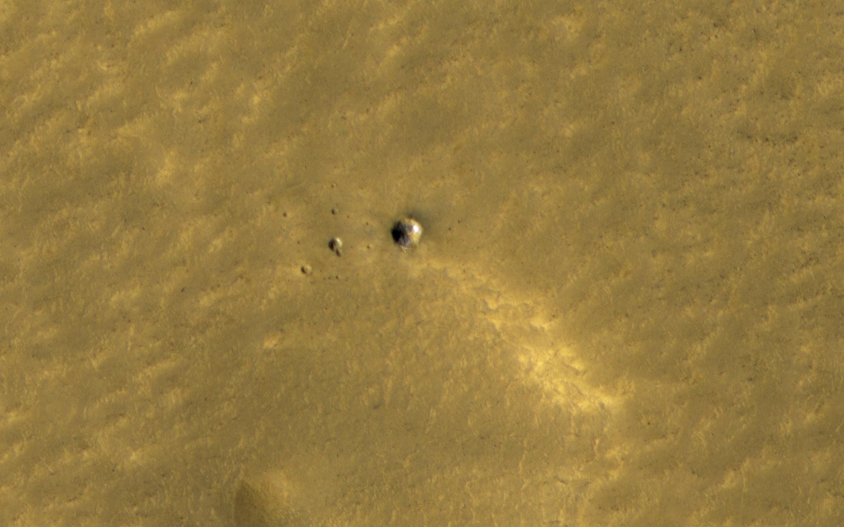Long-lasting Ice in a Young Crater