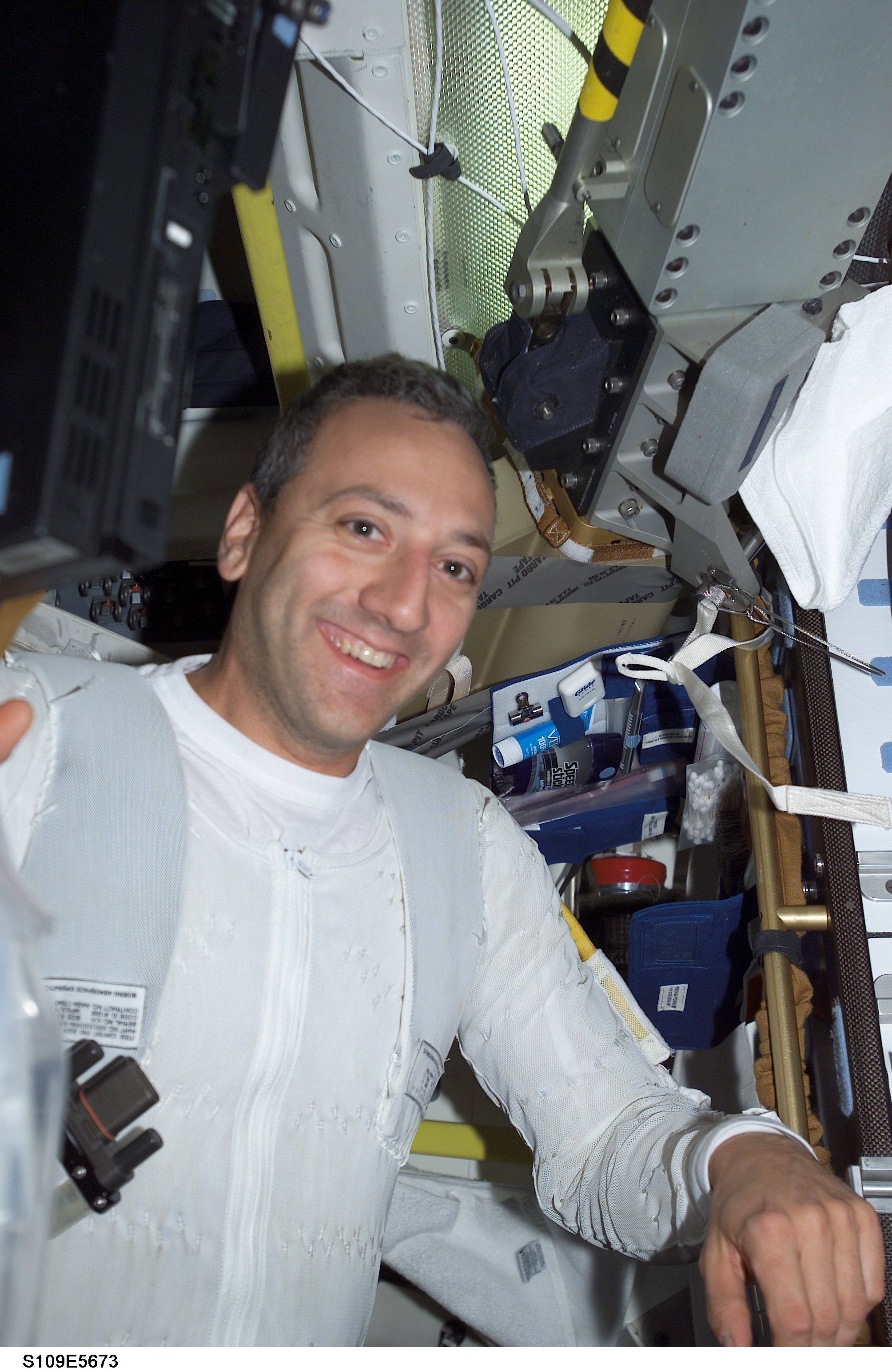MS Massimino on middeck prepares for EVA 4