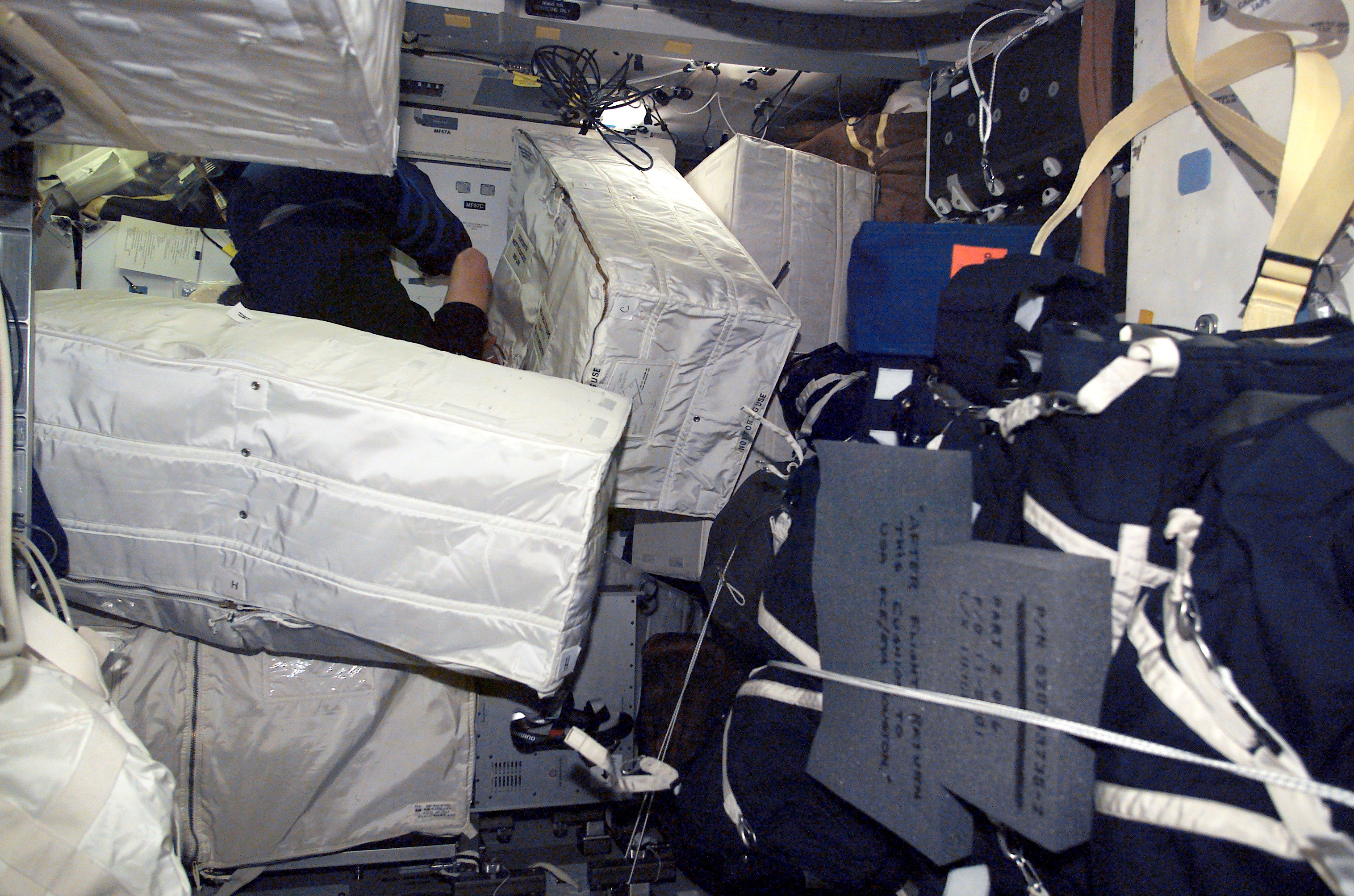 Cargo transfer and stowage bags in Endeavour's MDK during STS-111 UF-2 transfer OPS to ISS