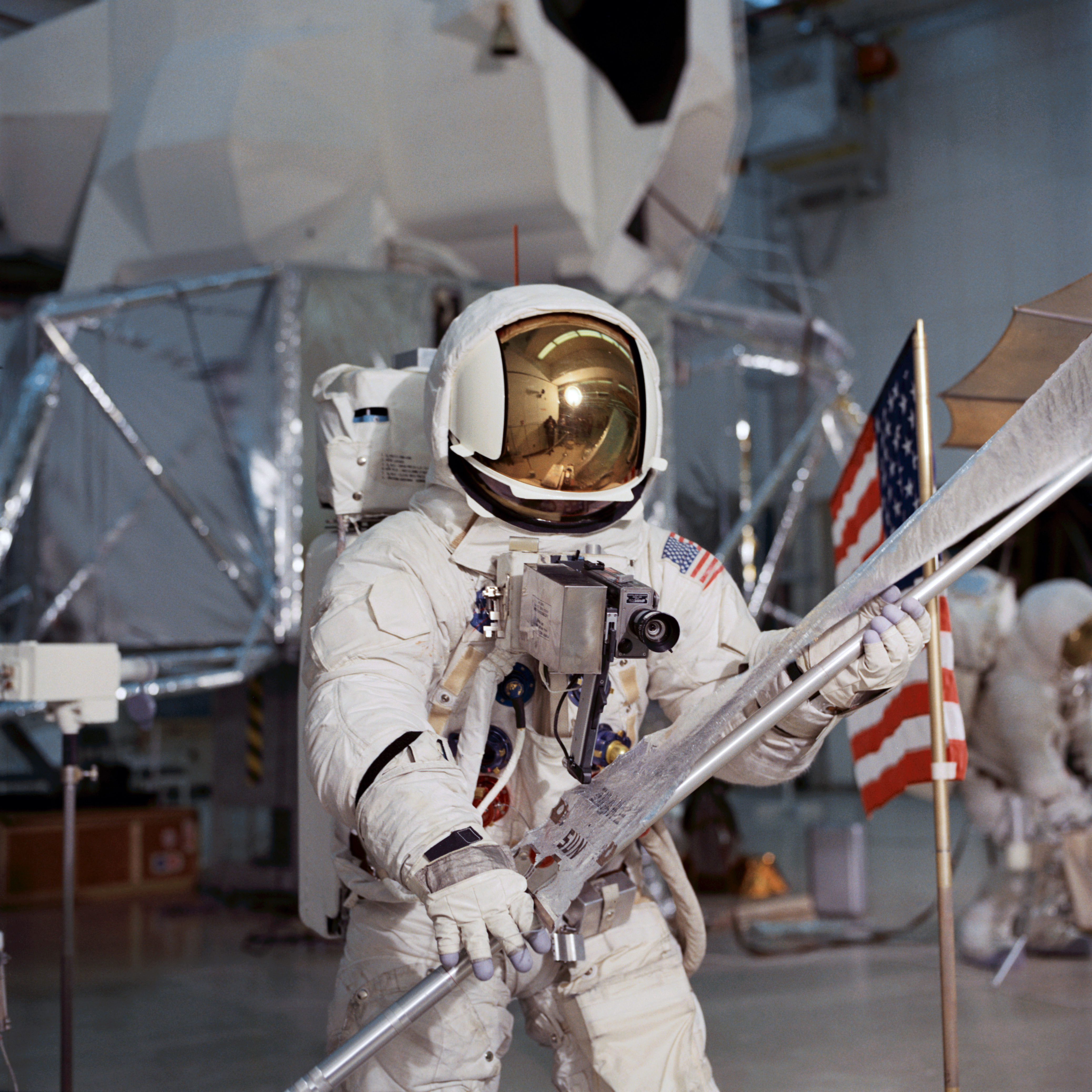 Astronaut Fred Haise simulates lunar surface EVA during training exercise