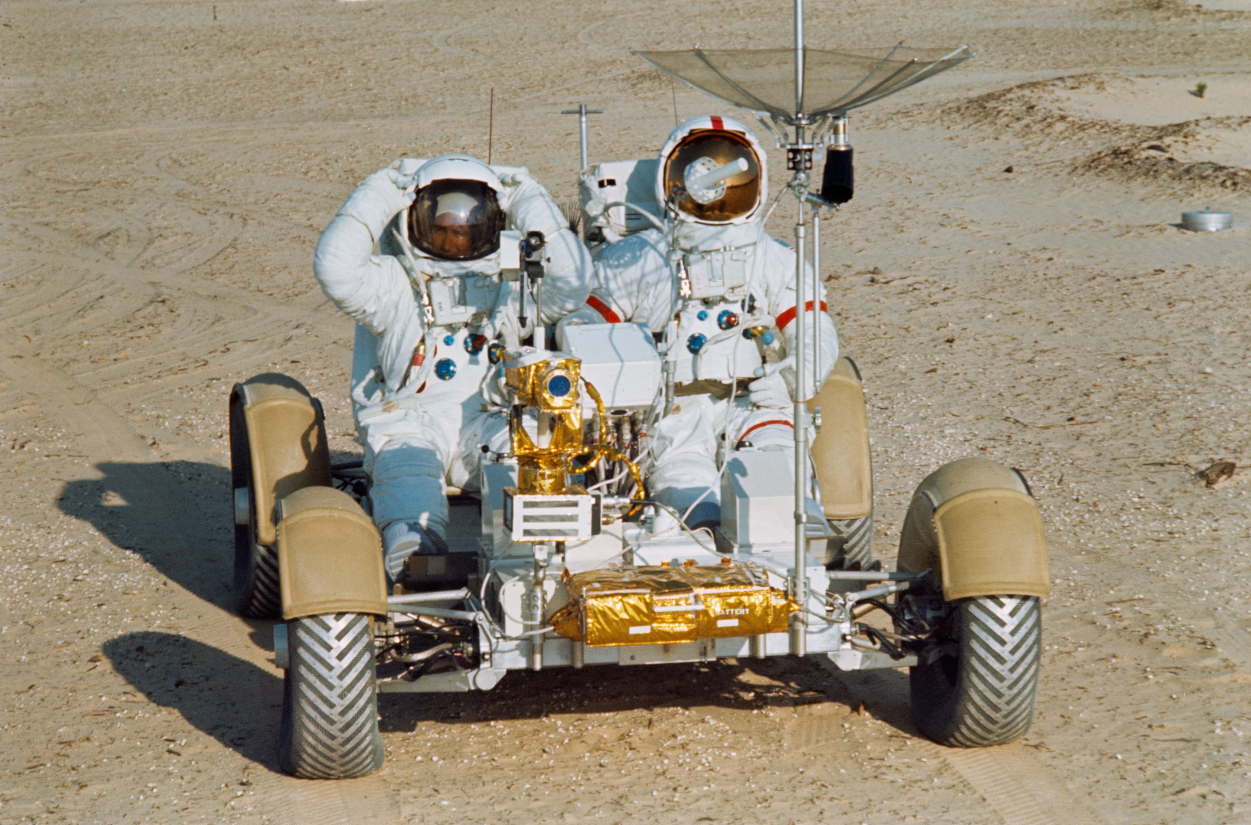 Astronauts Scott and Irwin shown on Lunar Roving Vehicle at KSC