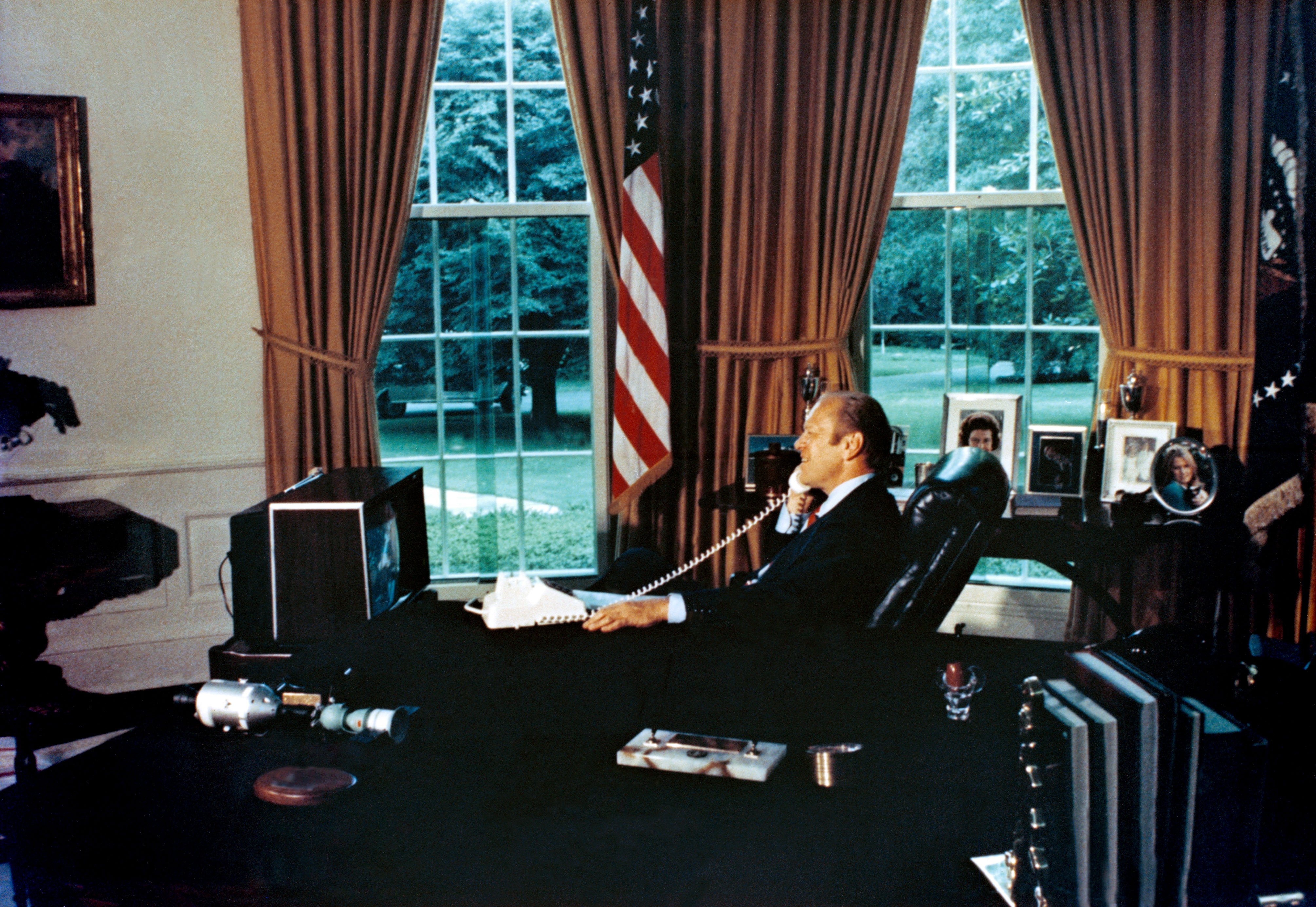 President Gerald Ford talks to ASTP crewmen via radio-telephone