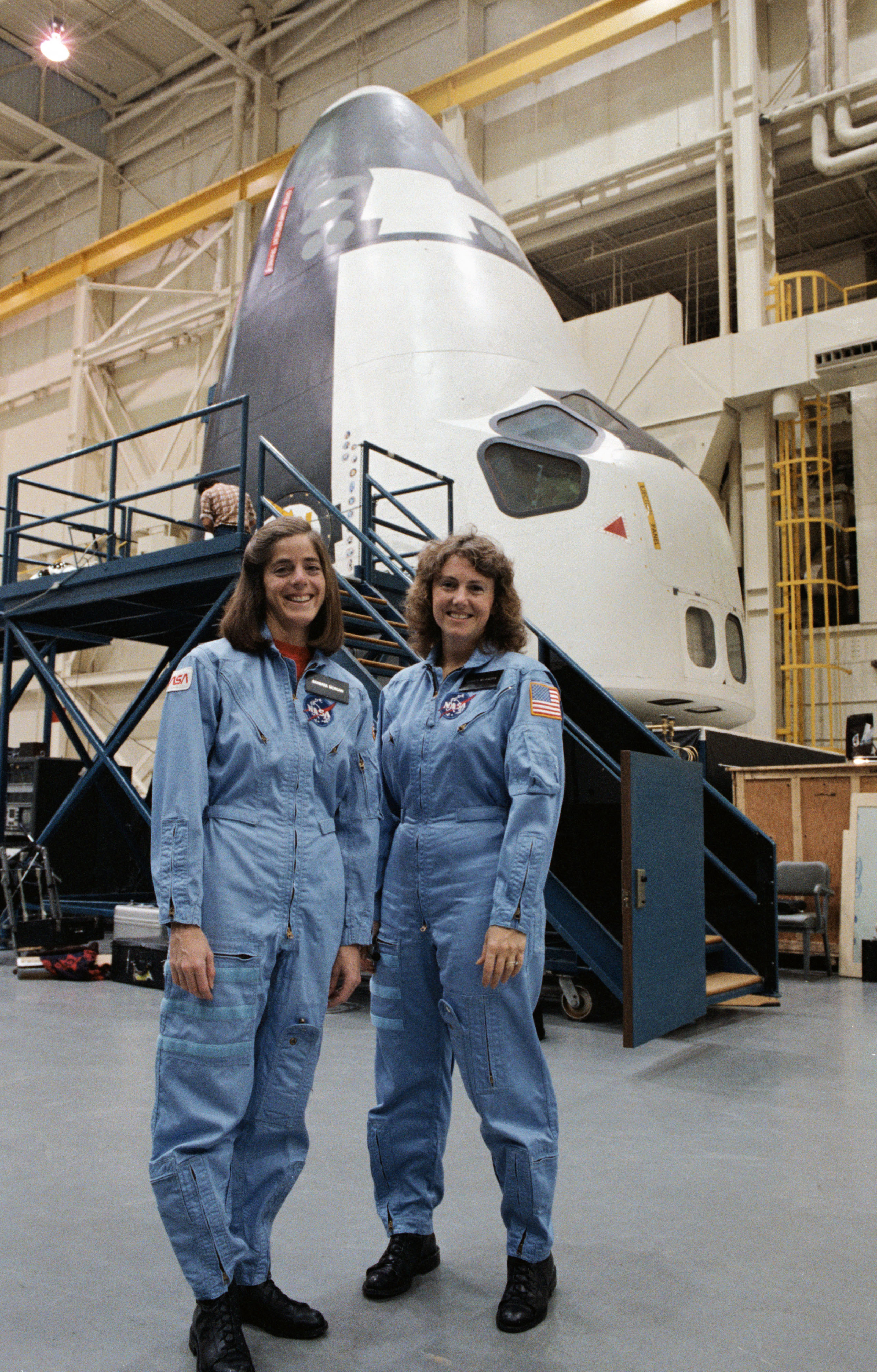 Christa McAuliffe and Barbara Morgan pose for photos after training