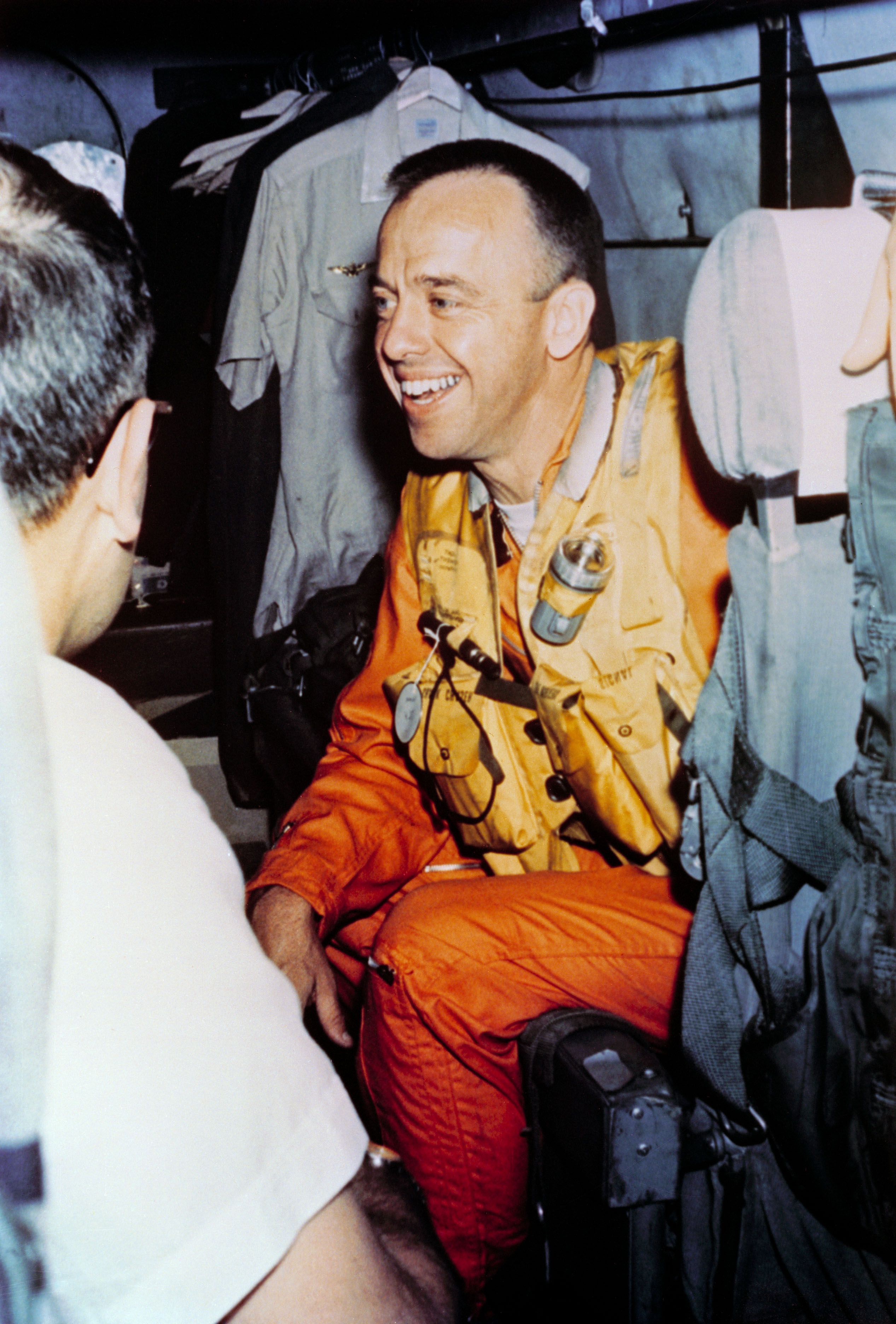 Astronaut Alan Shepard onboard helicopter after recovery of Mercury capsule