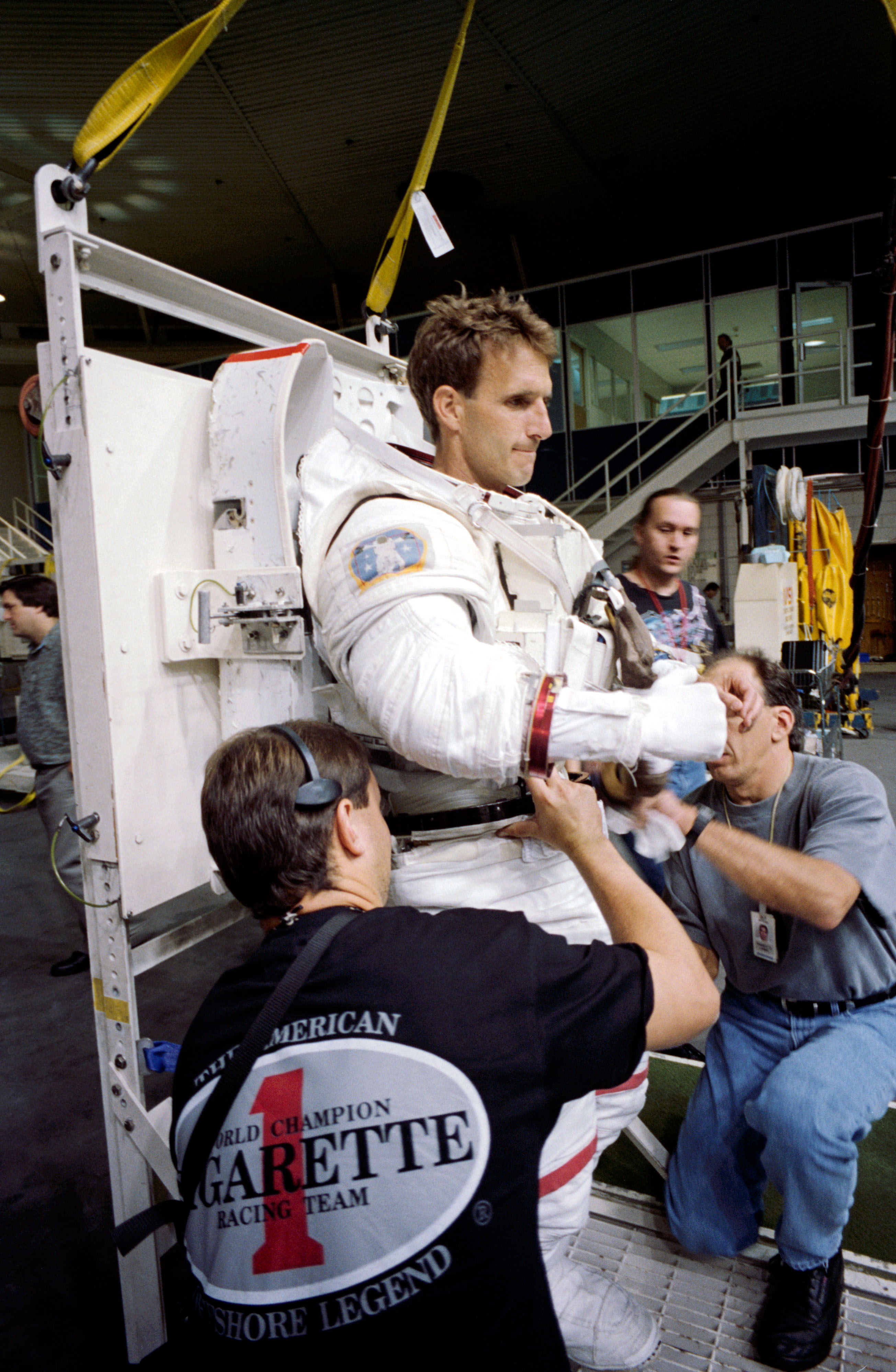 Astronauts Michael Foale and Jerry Linenger training with Russian Orlan suit