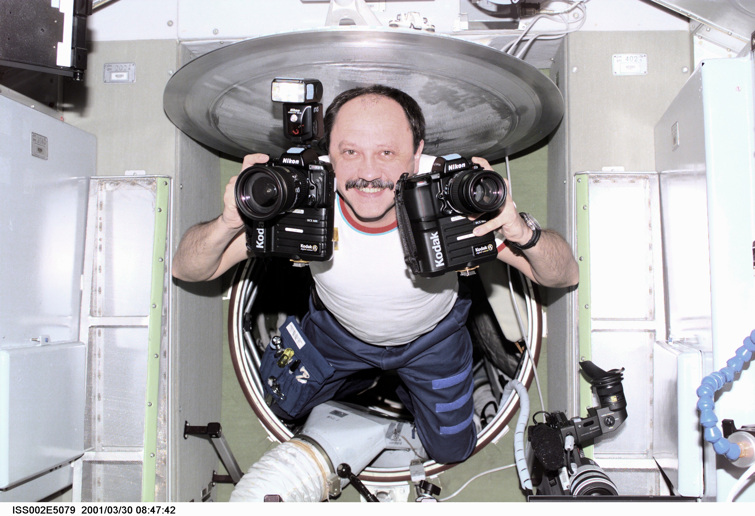 Usachev with cameras in Service Module