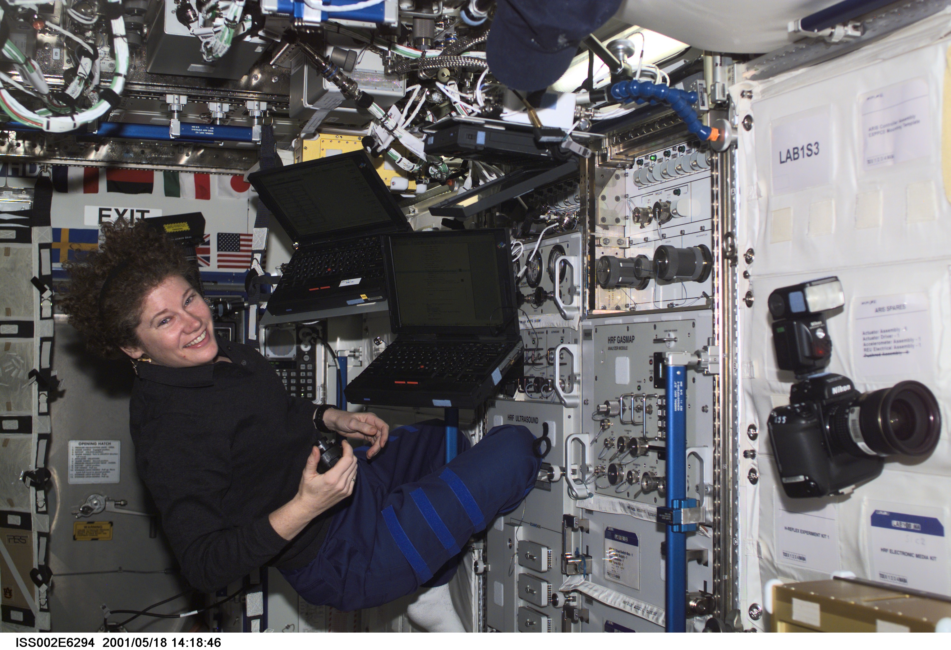 Helms with computers at HRF rack in Destiny module