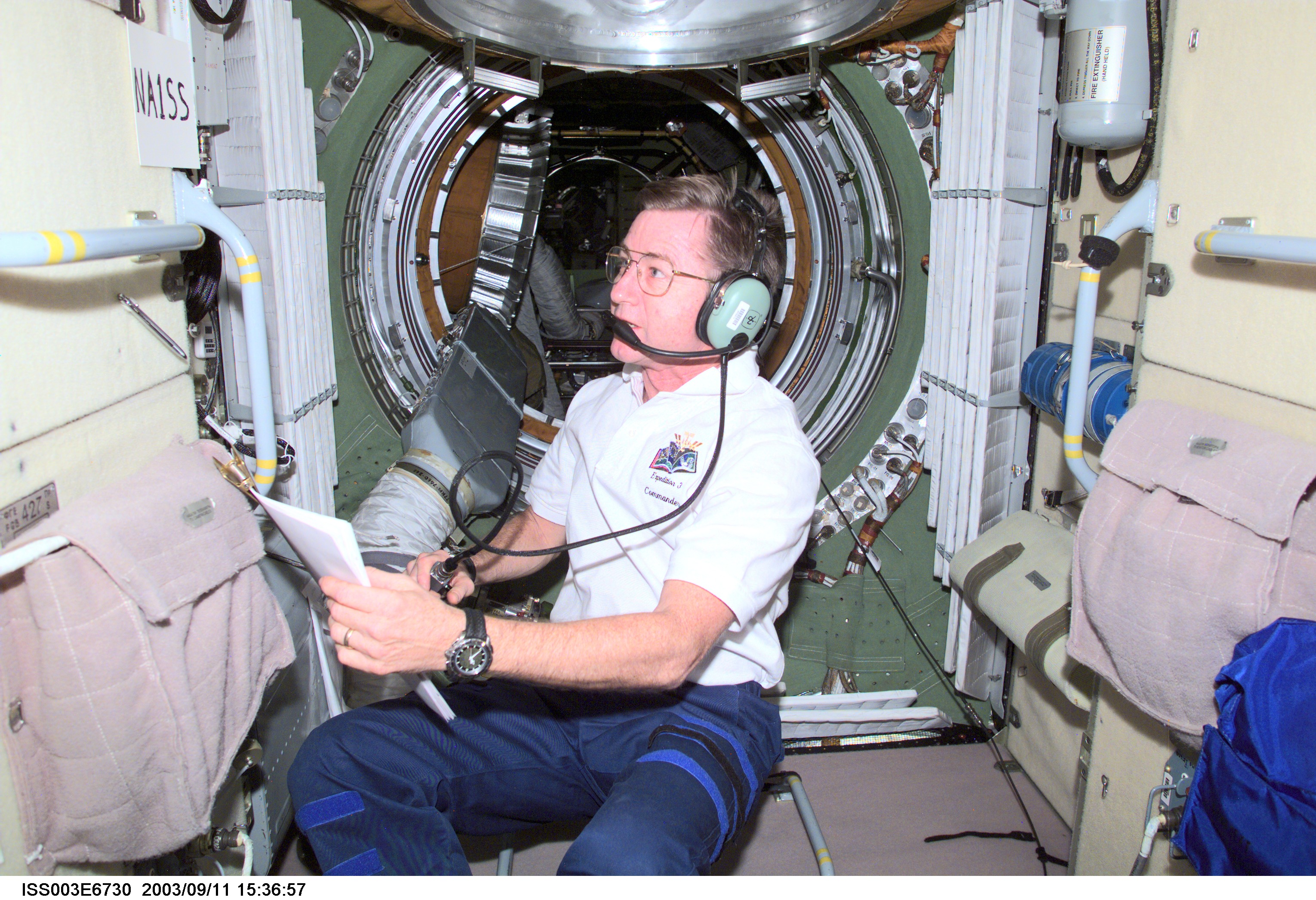 Culbertson uses the HAM radio equipment in the FGB during Expedition Three