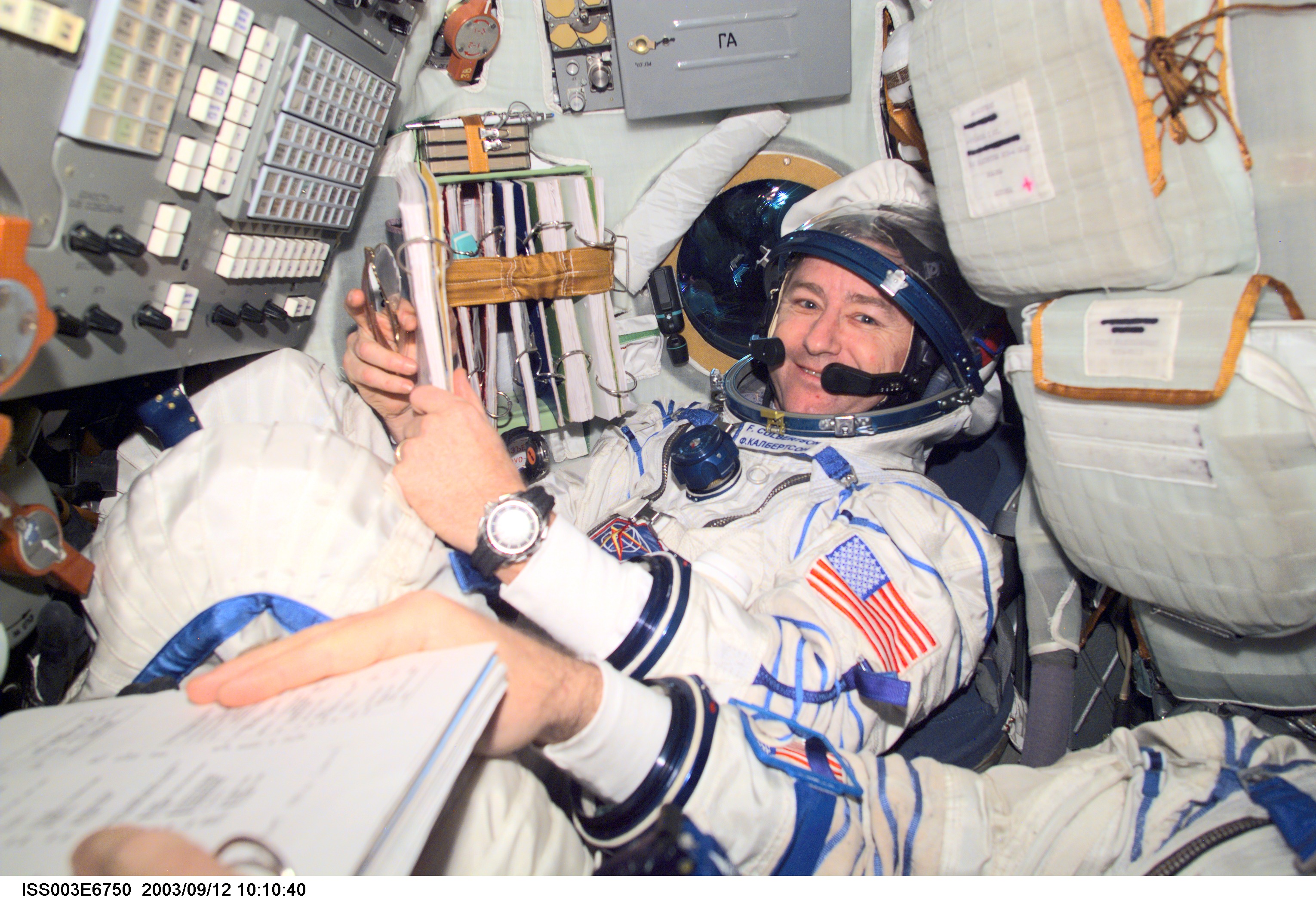 Culbertson in the Soyuz spacecraft during Expedition Three