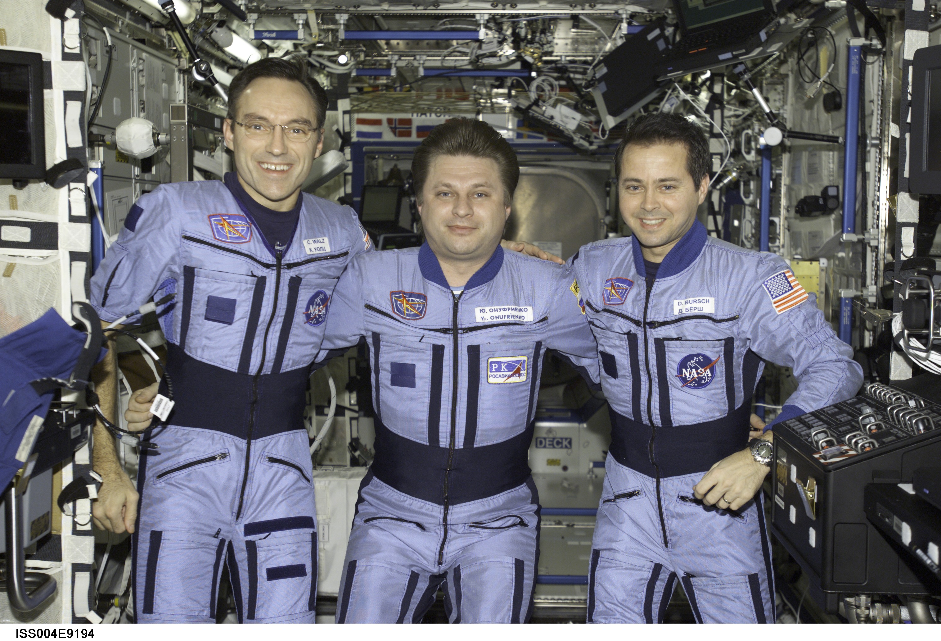 Expedition Four group photo in the U.S. Laboratory