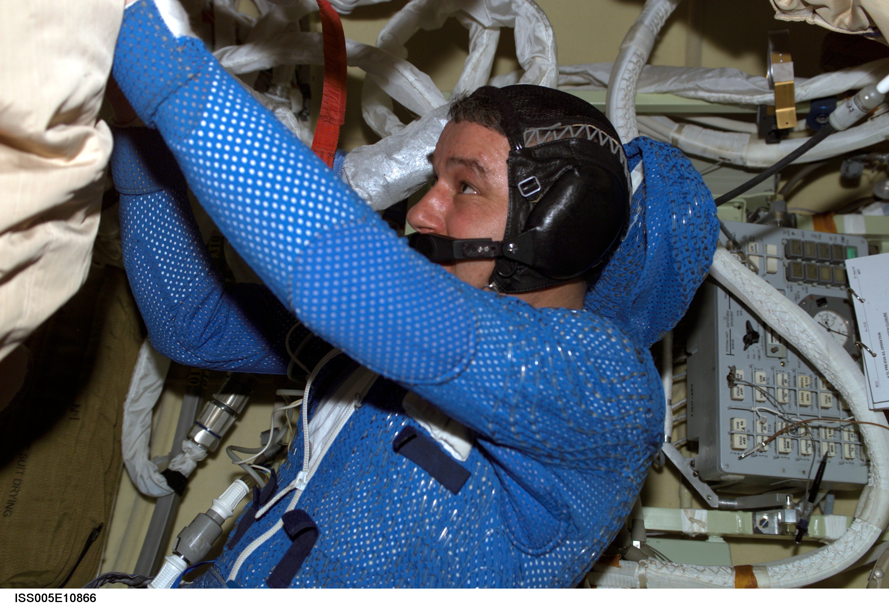 Korzun attired in his LCVG prepares for an EVA in the Pirs Docking Compartment