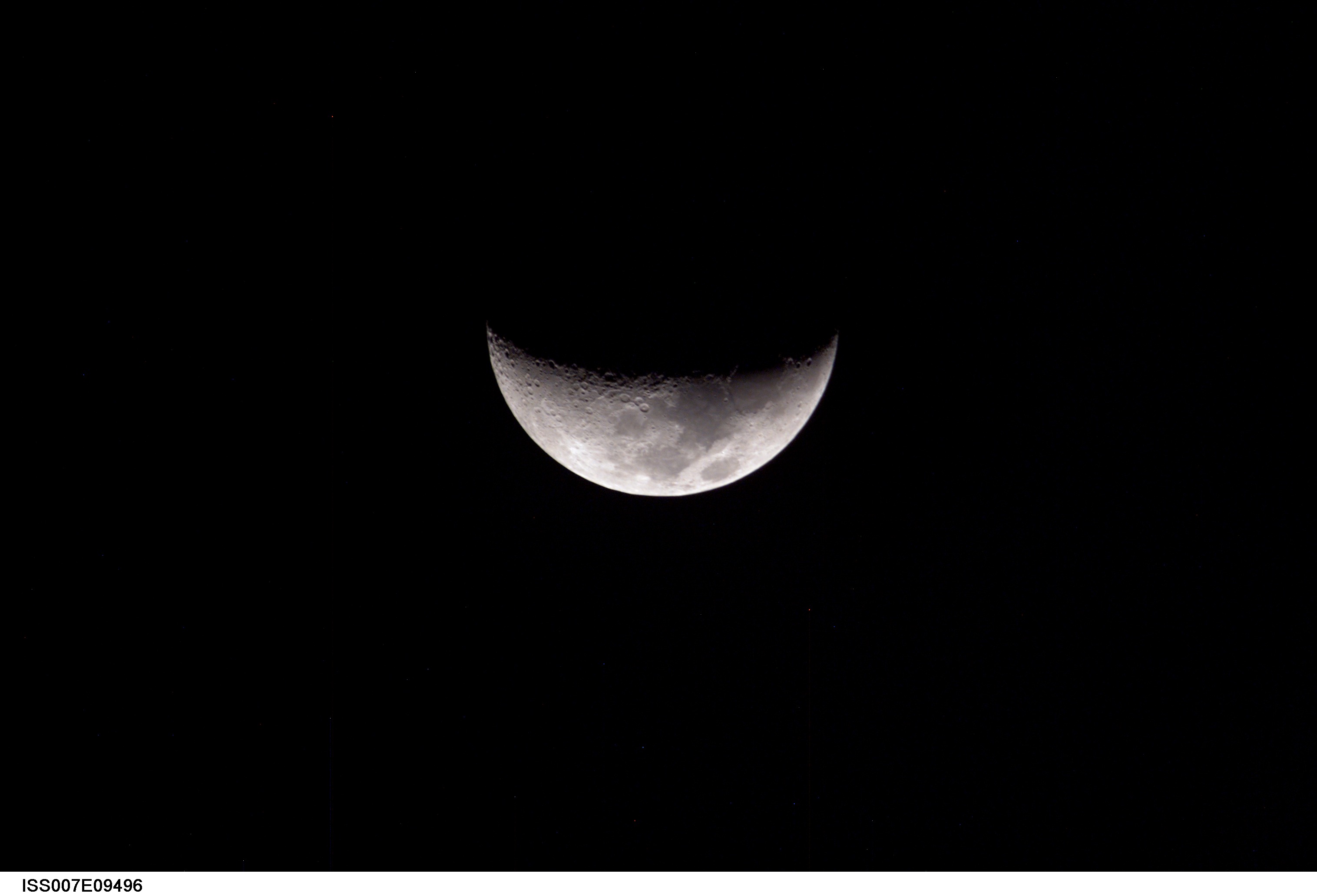 A partial moon was photographed by an Expedition 7 crewmember