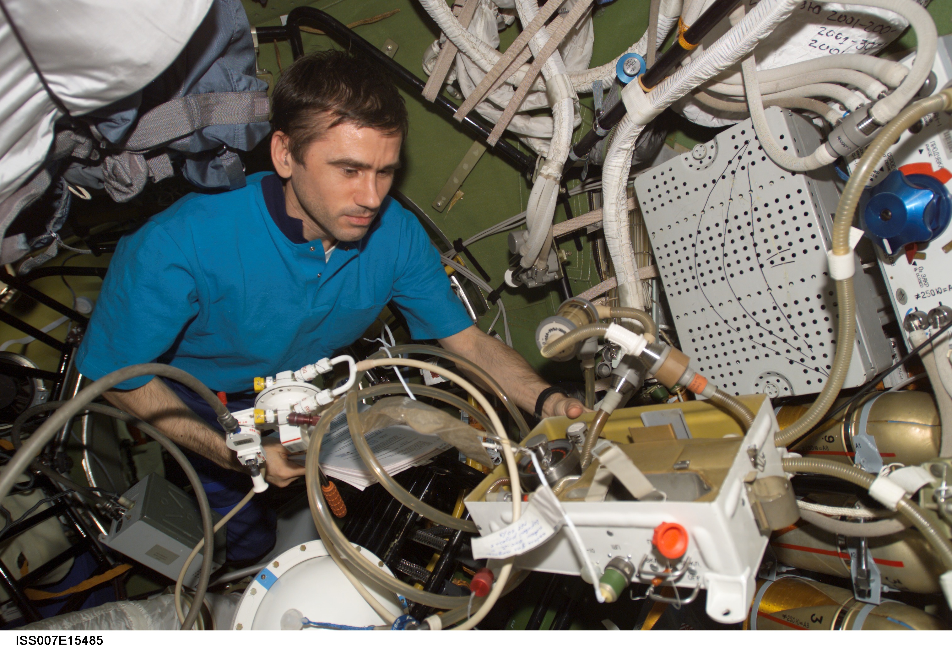 Malenchenko during checkout of Orlan spacesuits