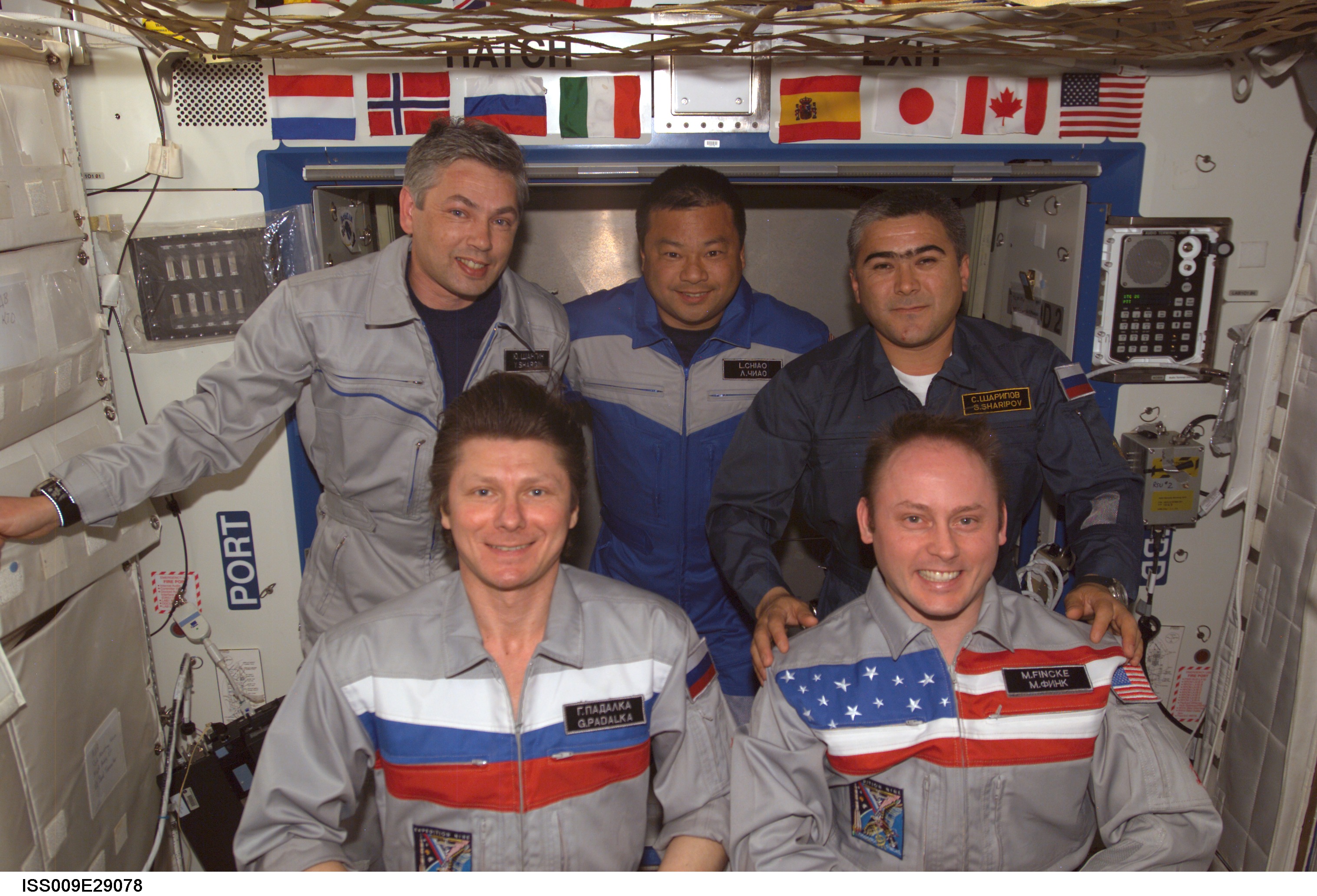 Expedition 9 and 10 crewmembers pose for a crew photo during Exp. 9/10 joint operations
