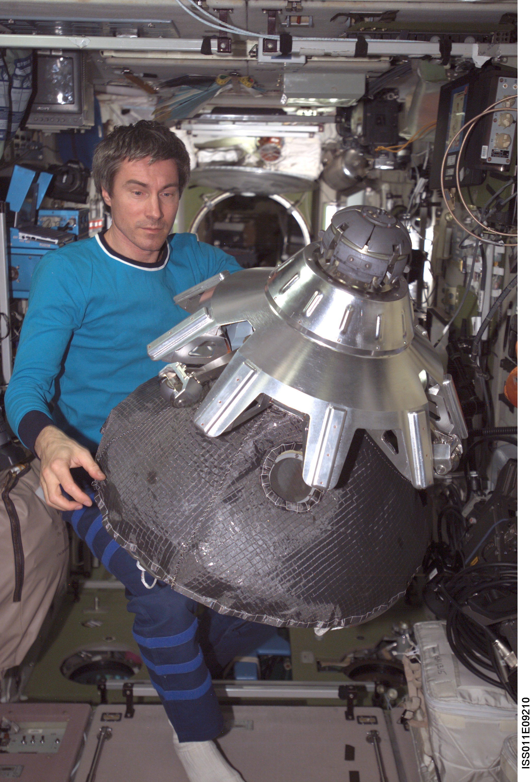 Krikalev with probe-and-cone docking mechanism (StM) in the Zvezda module