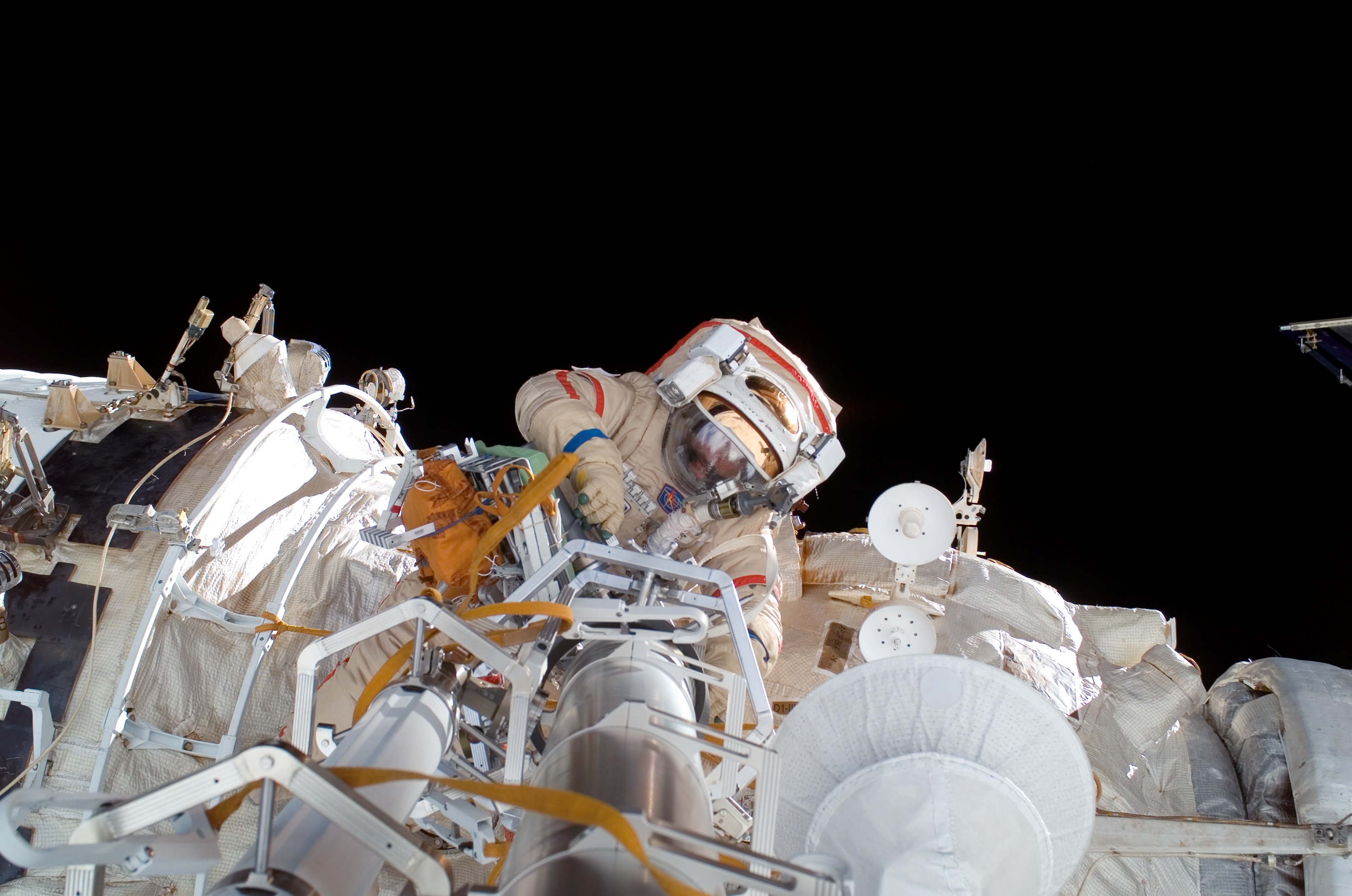 Vinogradov makes a repair to the Elektron vent on the SM during Expedition 13