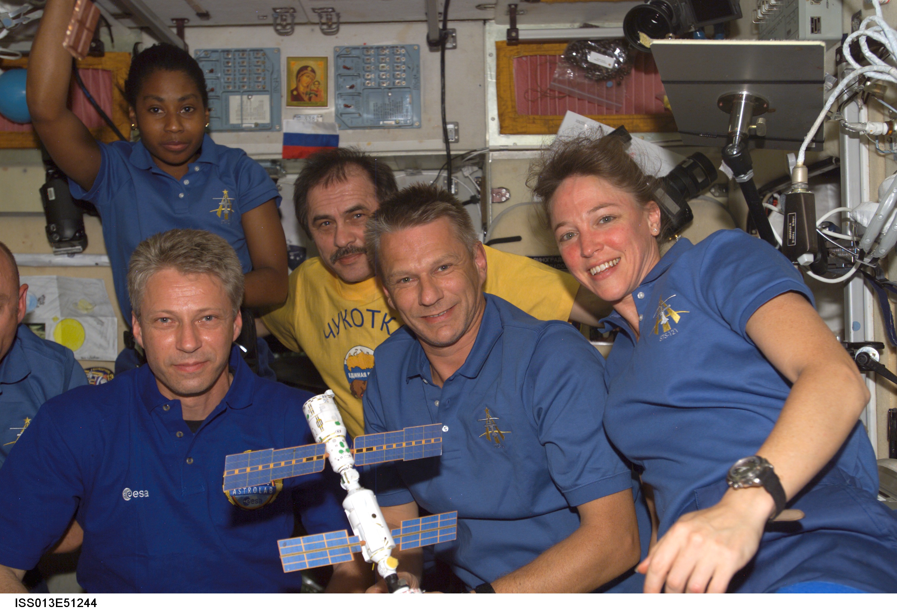 Group shot of Expedition 13 and STS-121 crewmembers taken during joint operations
