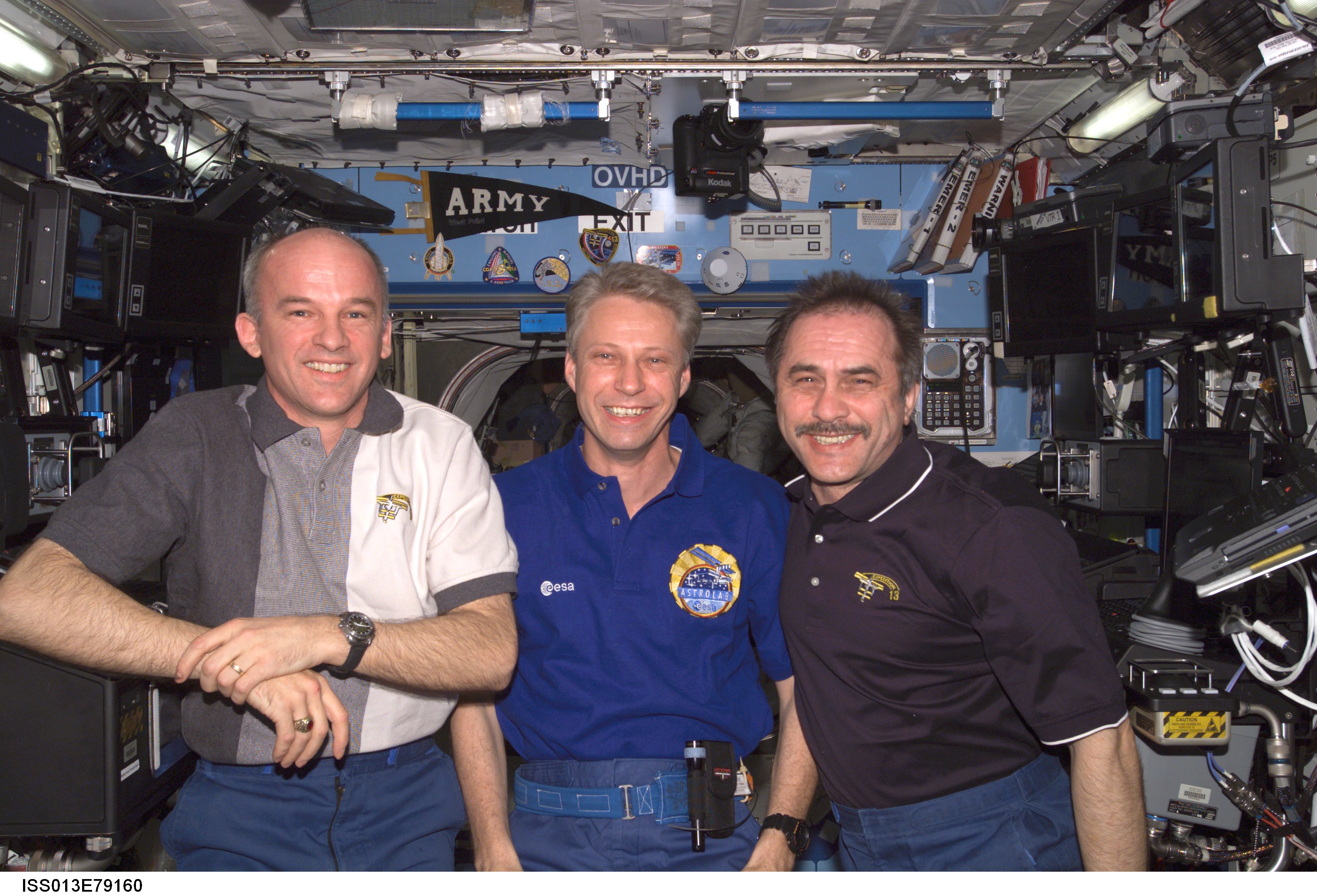 Expedition 13 Crew poses for portrait in the U.S. Laboratory