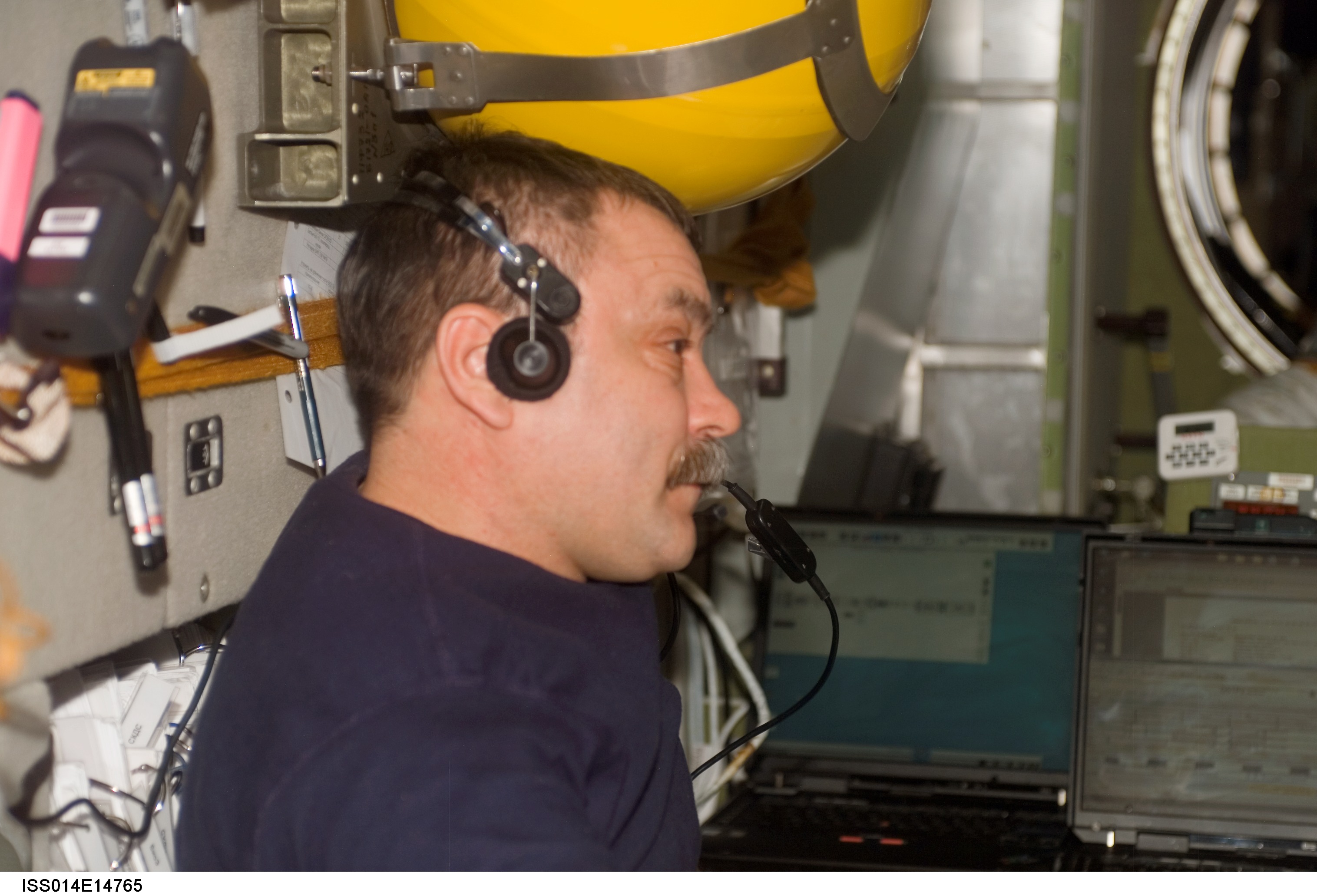 Tyurin in Zvezda with communication system