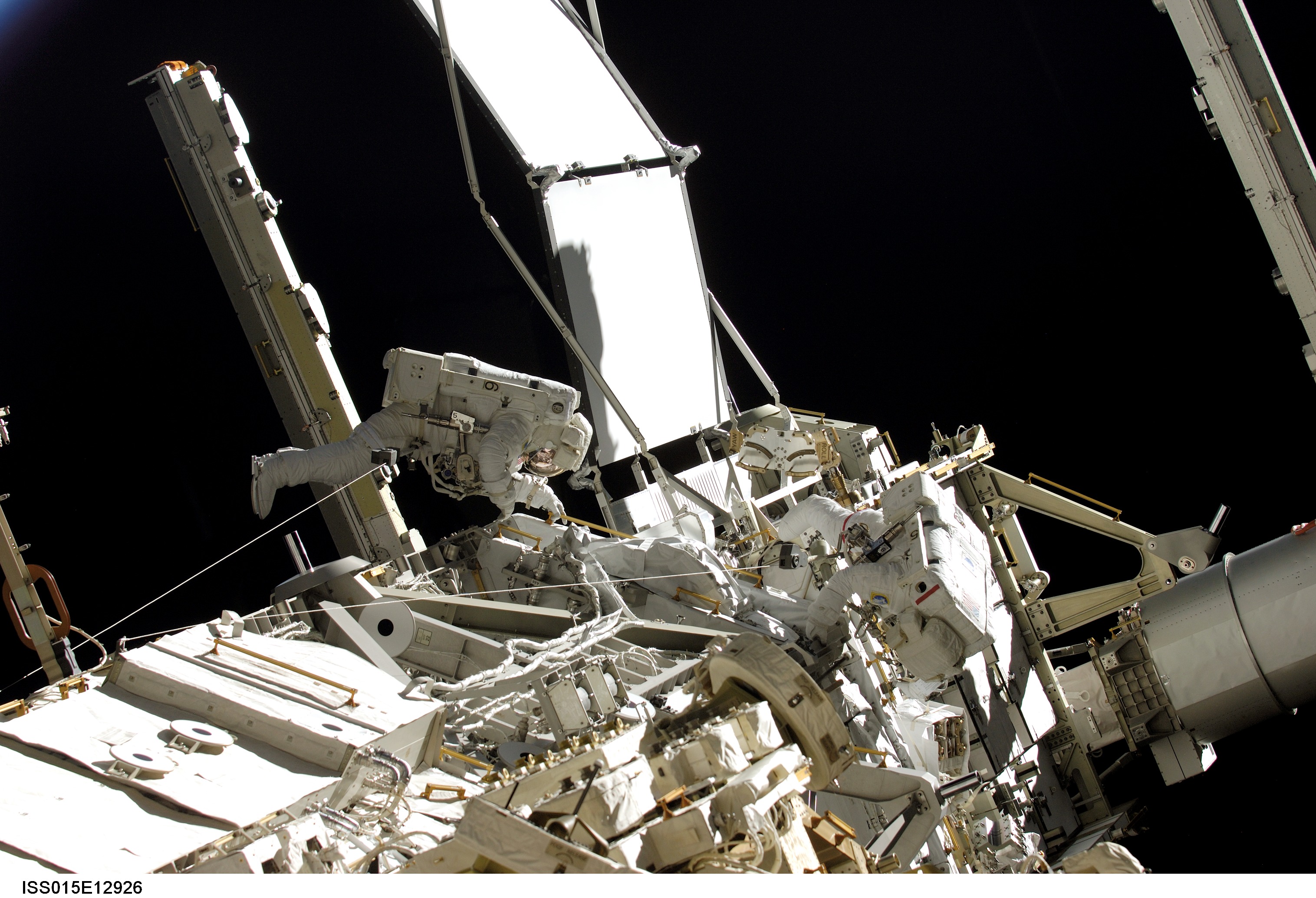 Olivas and Reilly participating in EVA during Expedition/STS-117 Joint Operations