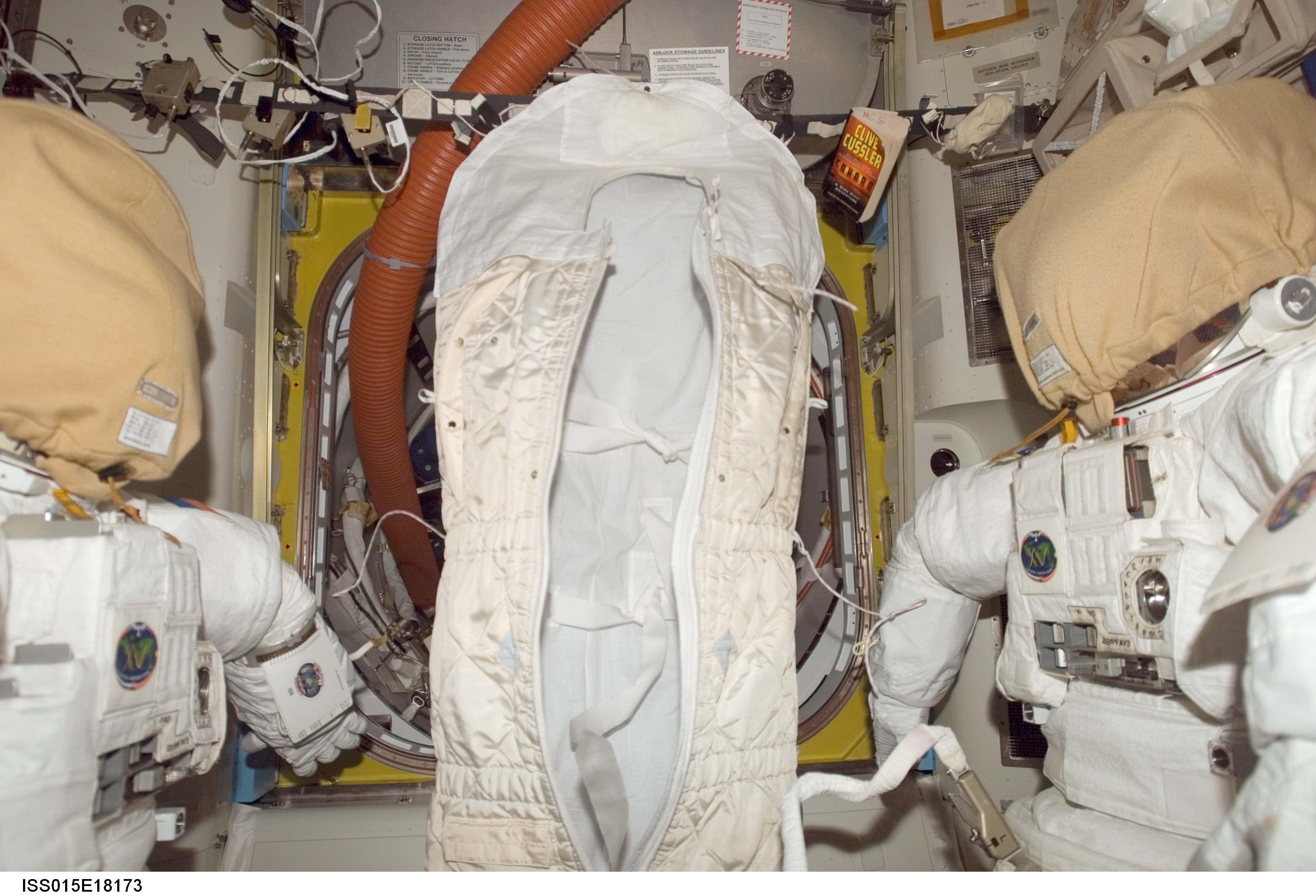 View of a Sleeping Bag and EMUs in the A/L during Expedition 15