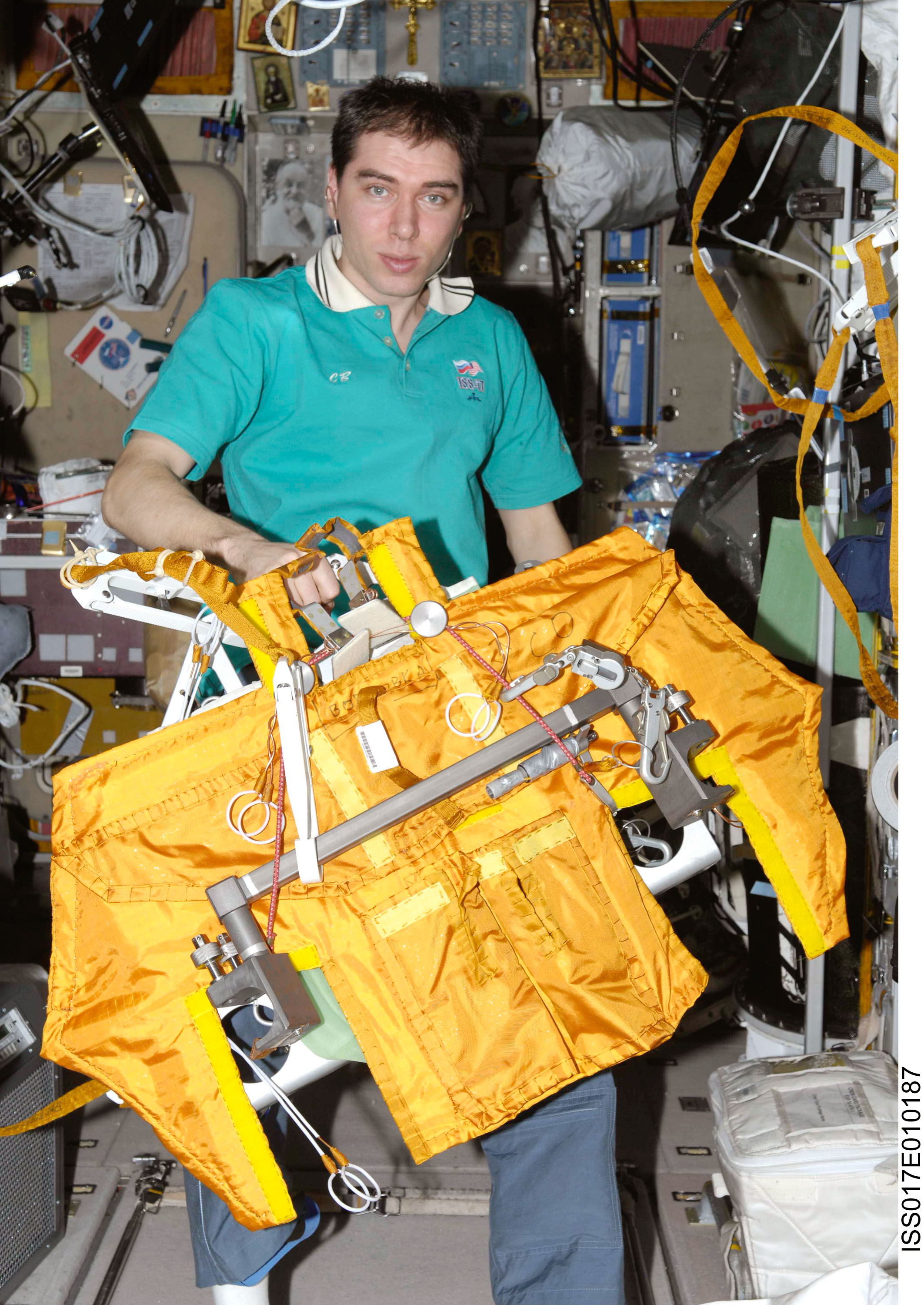 Volkov holds EVA Tool Caddy in the SM during Expedition 17