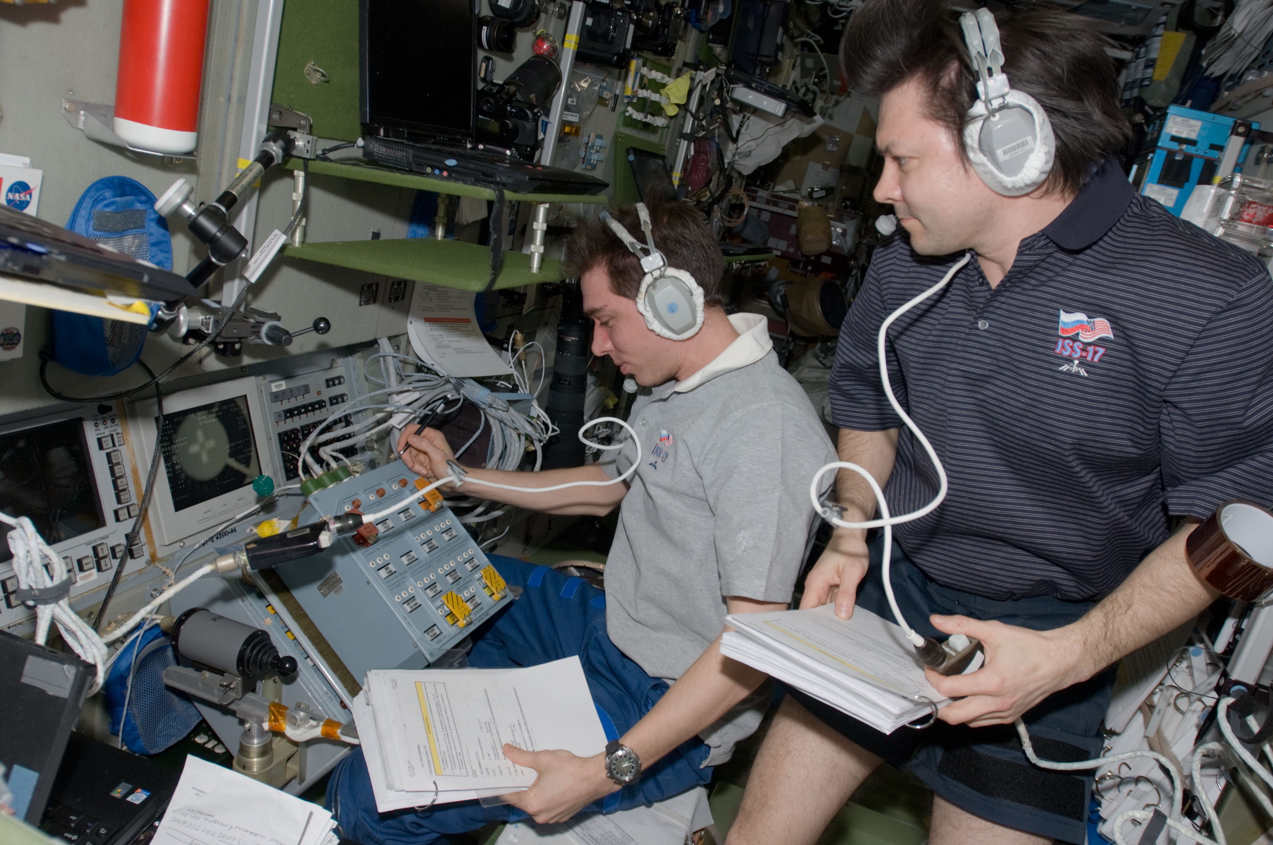 Volkov and Kononenko prepare for the undocking of the ESA Jules Verne ATV during Expedition 17