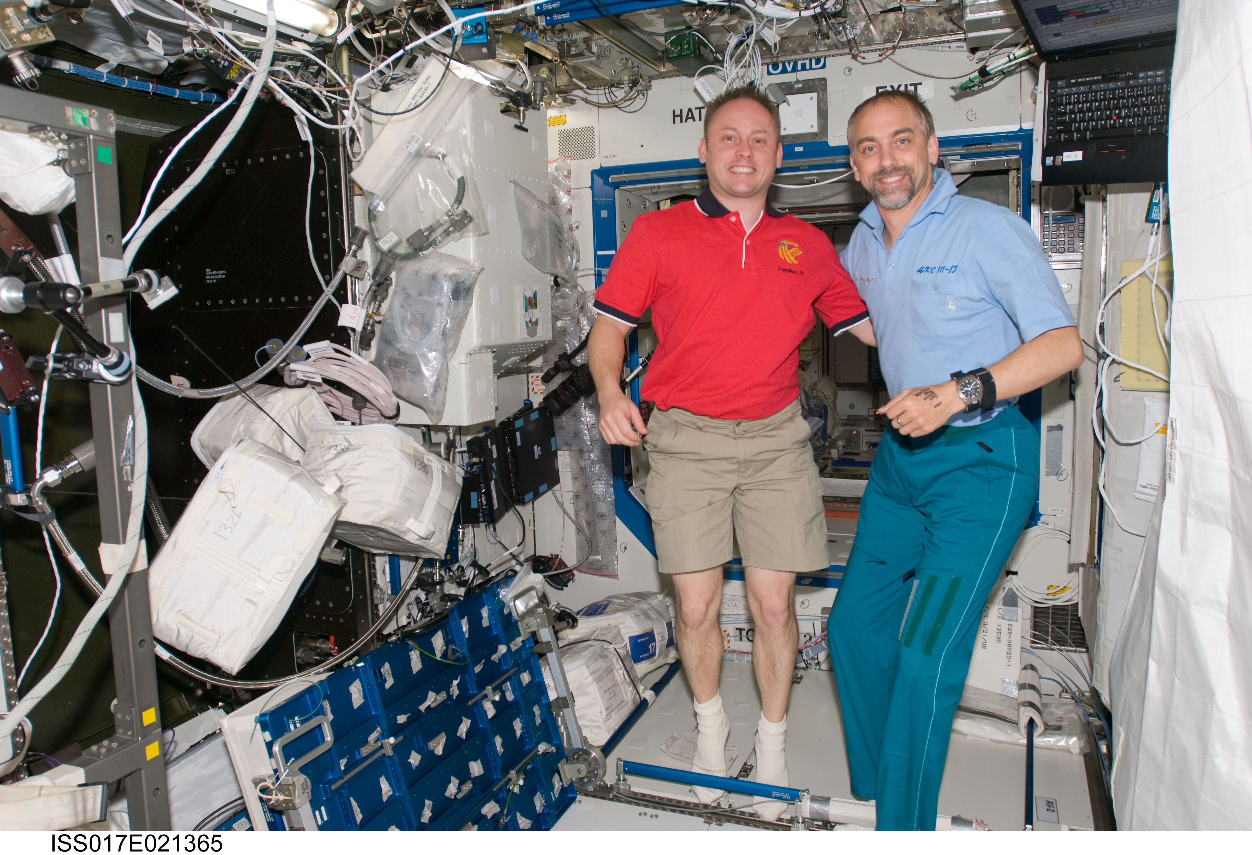 Expedition 18 Crewmembers in the U.S. Laboratory during Joint Operations
