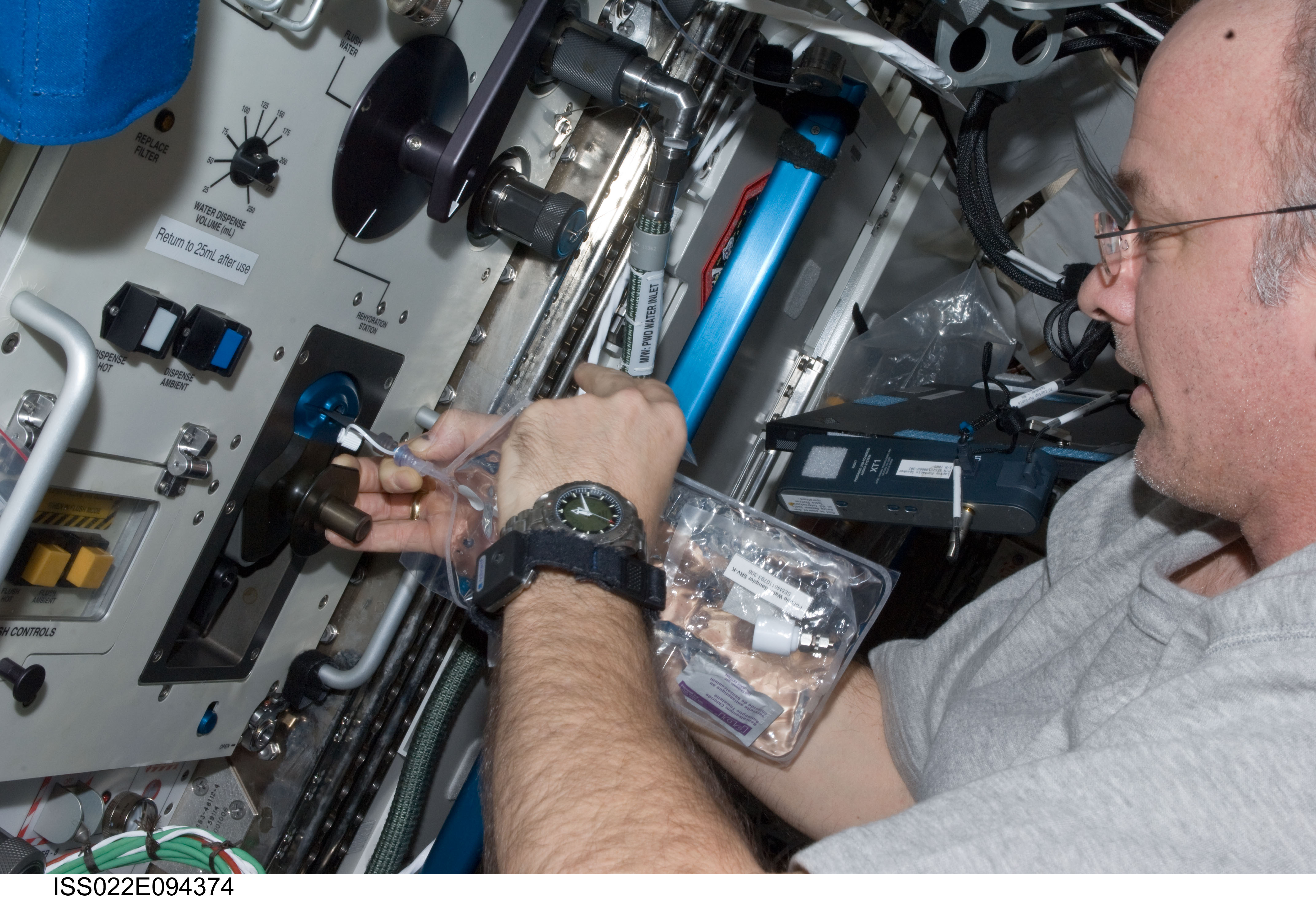Williams conducts SWAB Sampling during Expedition 22