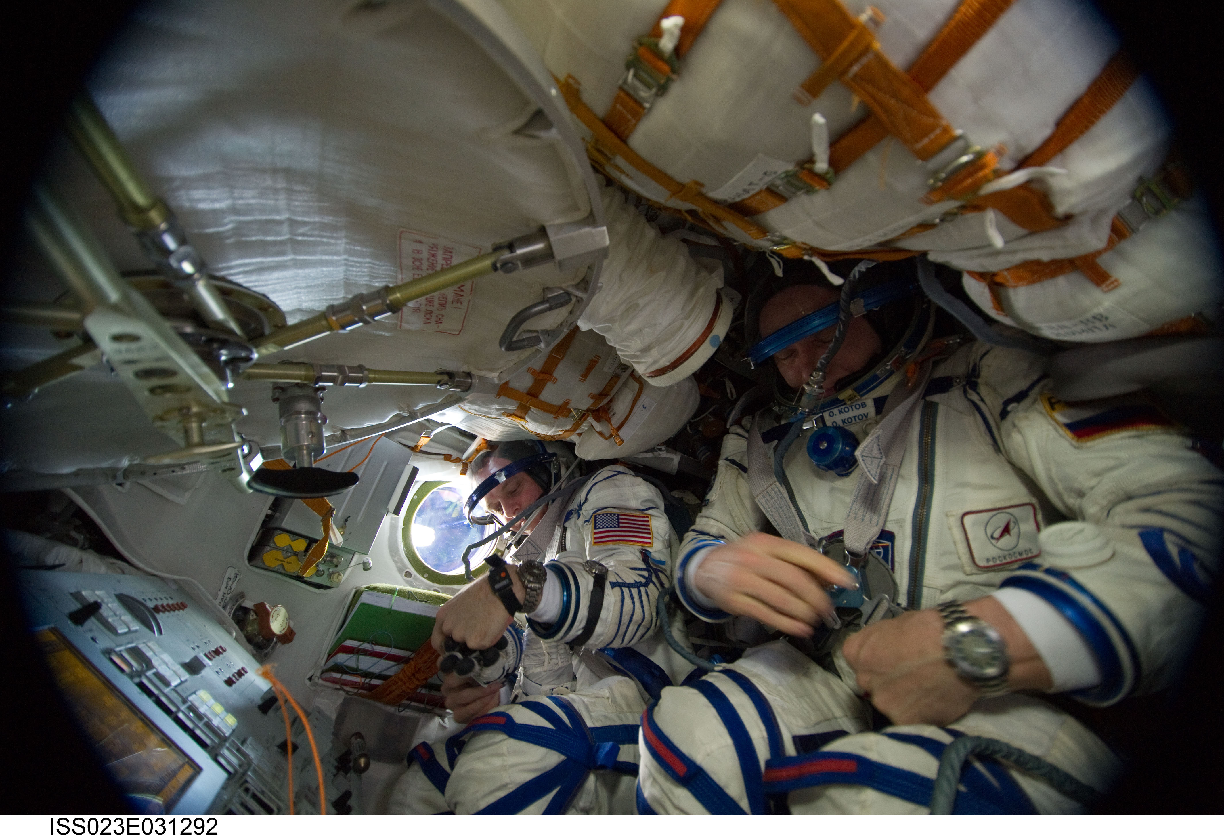 Crewmembers in Soyuz TMA-17/21S during Sokol Suit Leak Check