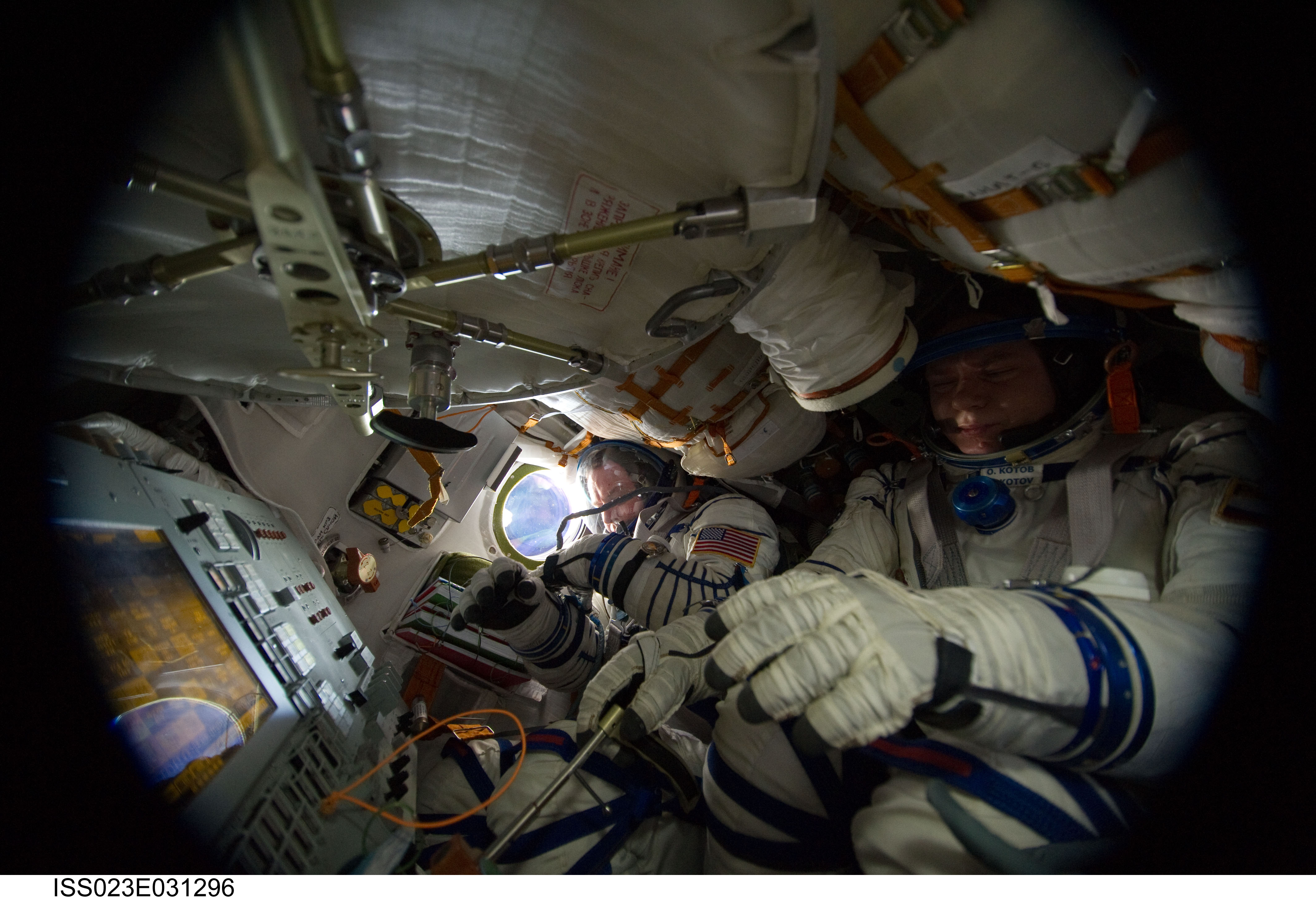 Crewmembers in Soyuz TMA-17/21S during Sokol Suit Leak Check