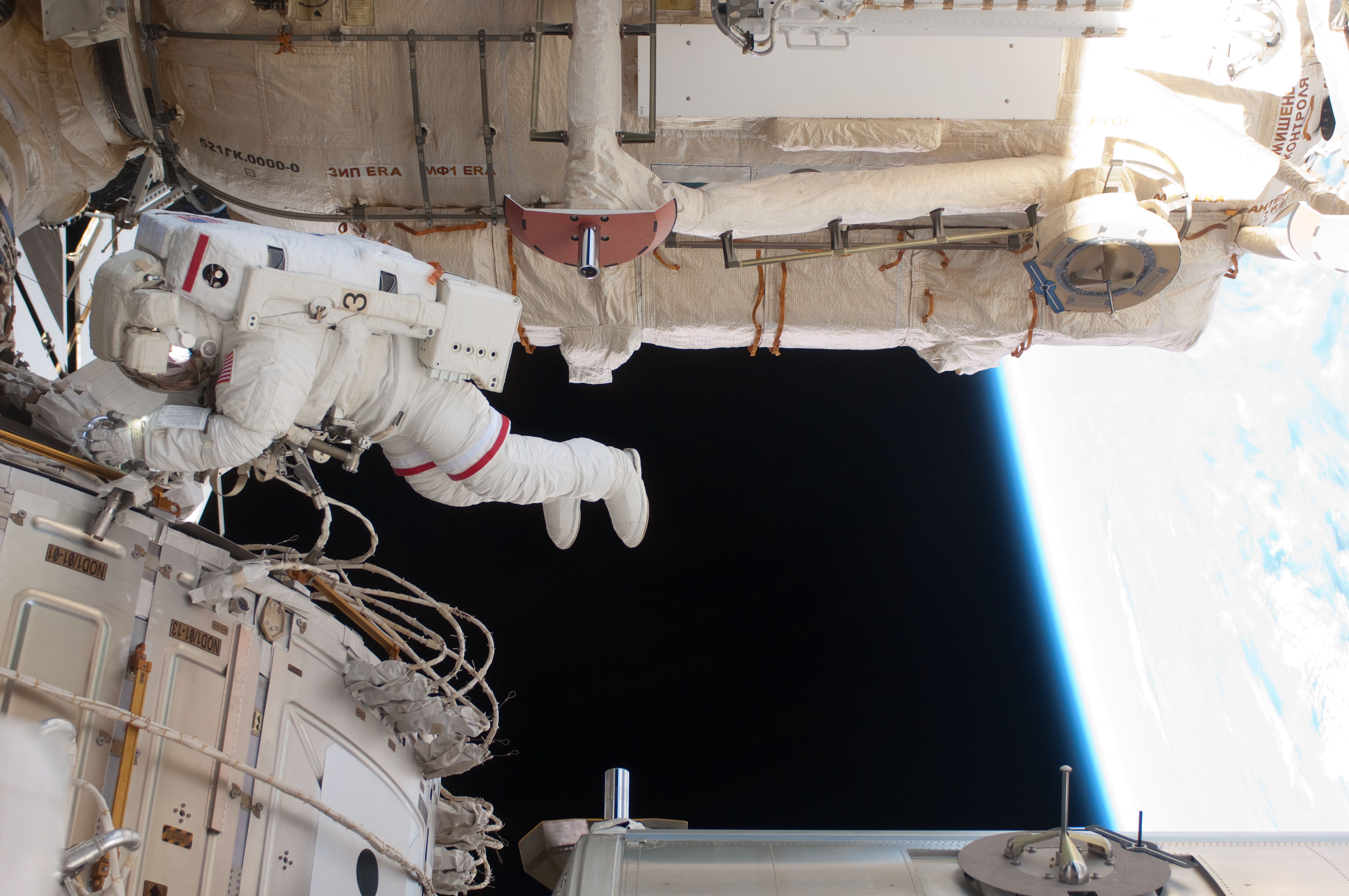 View of STS-134 MS Feustel working during EVA-3