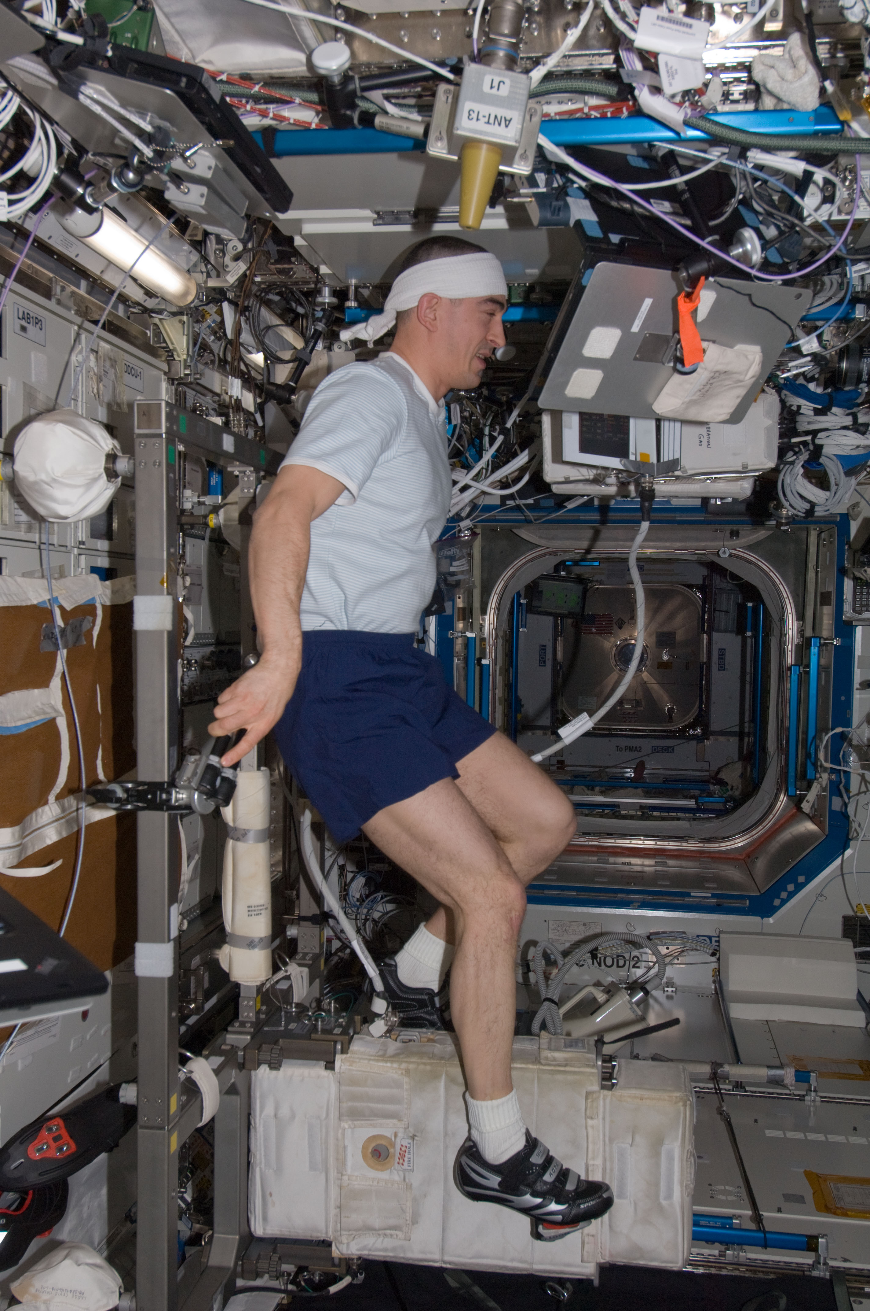Ivanishin exercises on the CEVIS in the U.S. Laboratory
