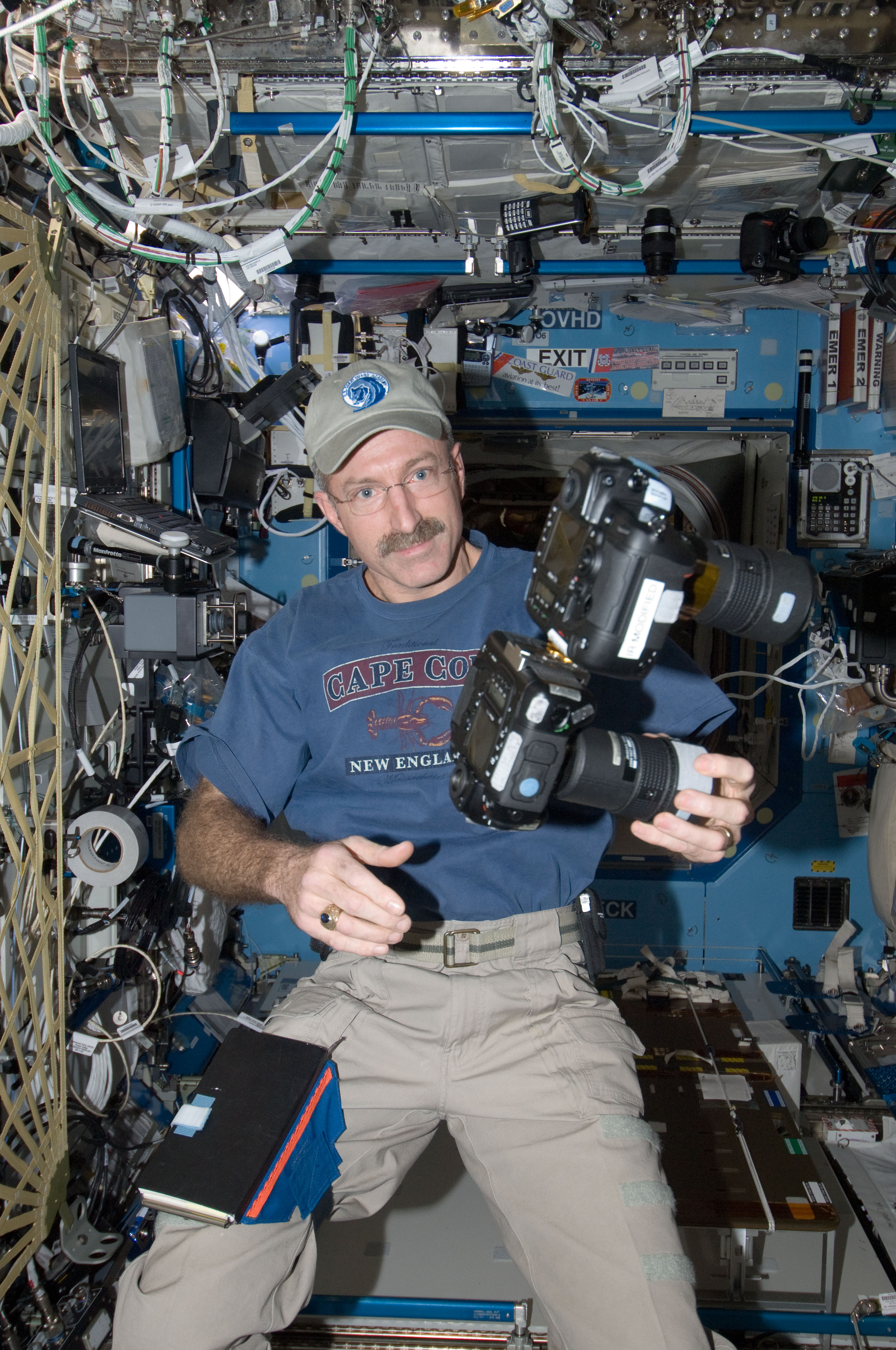 Burbank holds still camera in the U.S. Laboraotry