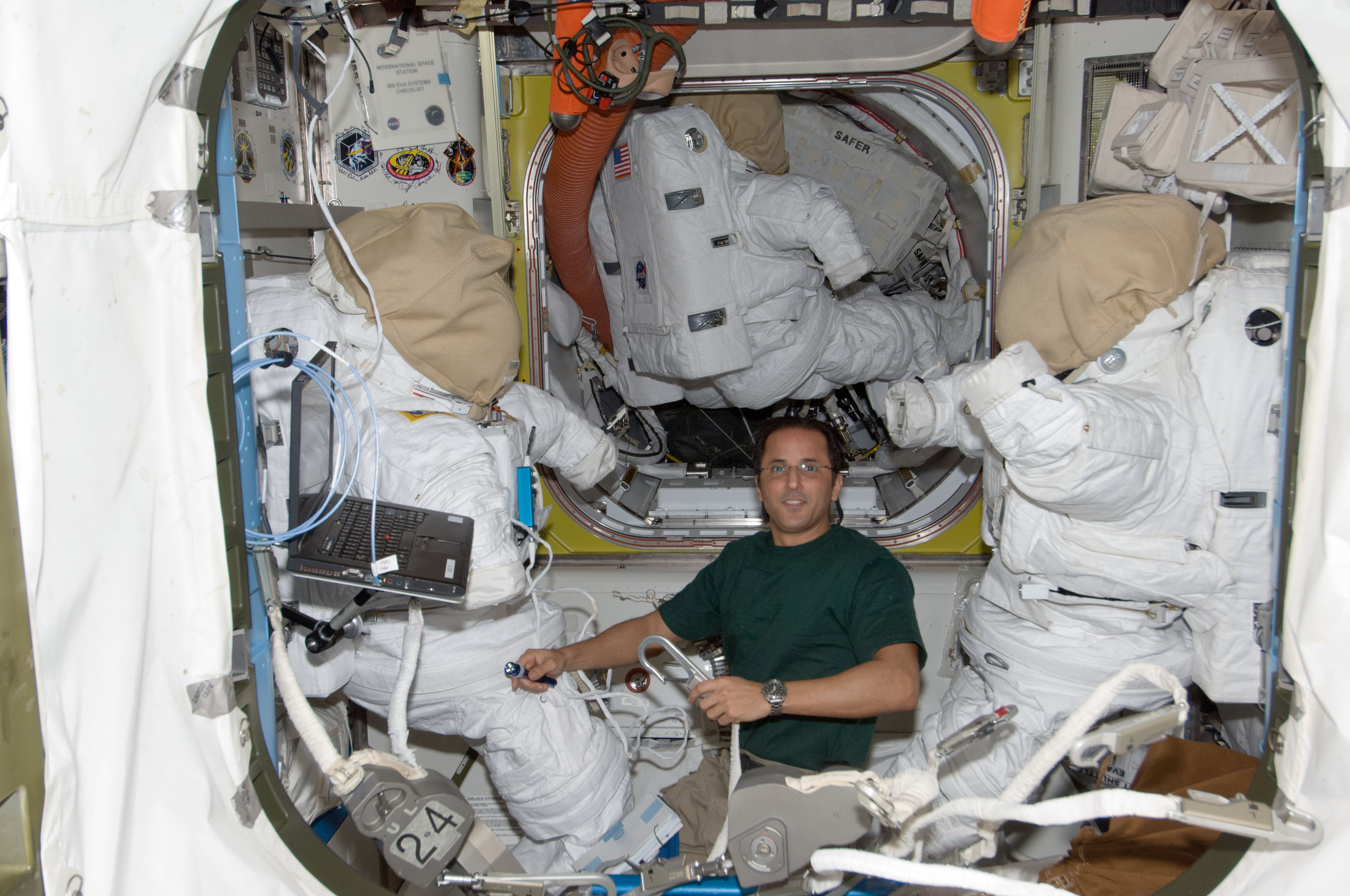 FE Acaba works with EVA Equipment in the Airlock