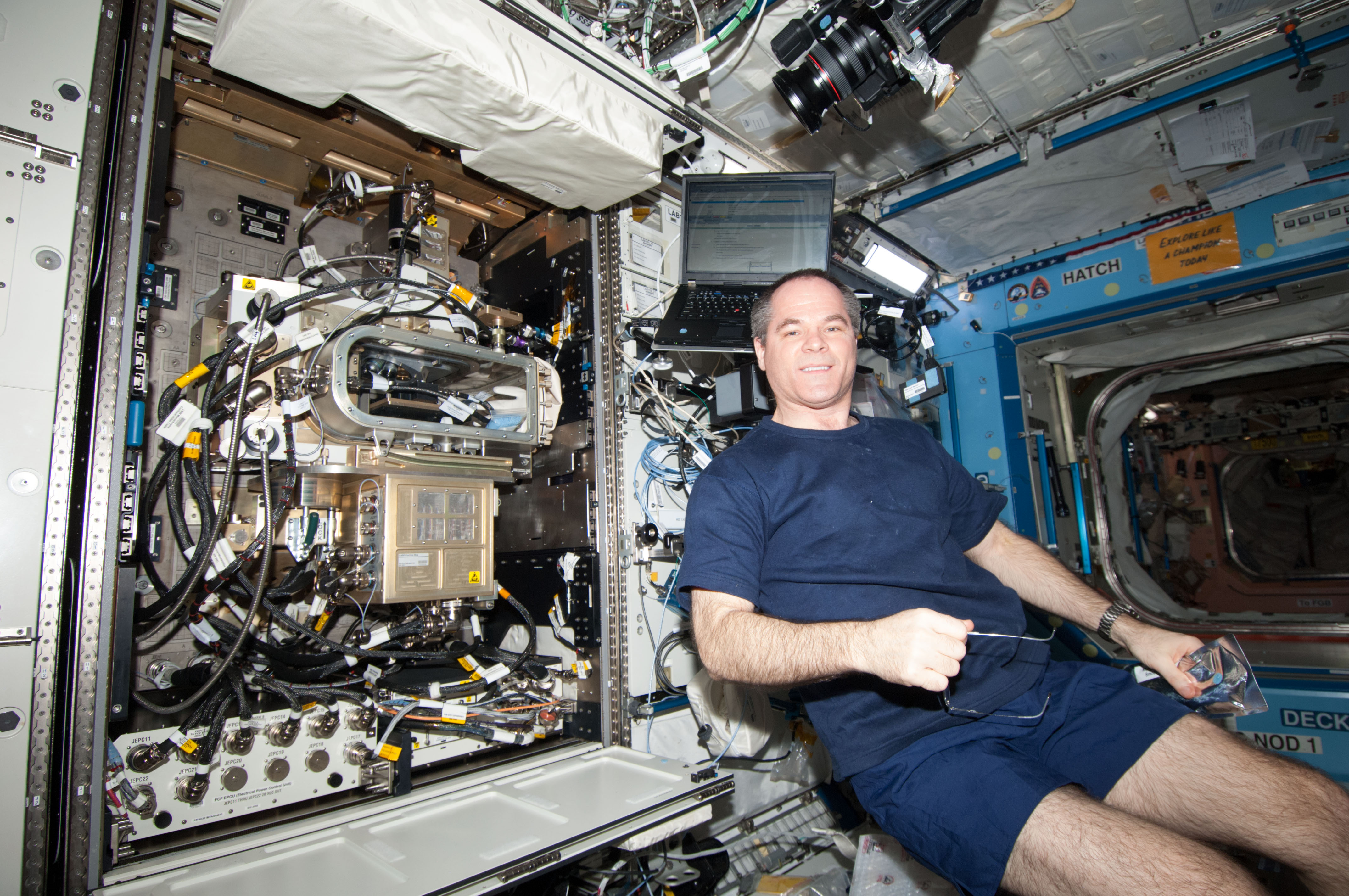 Ford poses at the FIR/LMM/ACE in the U.S. Laboratory