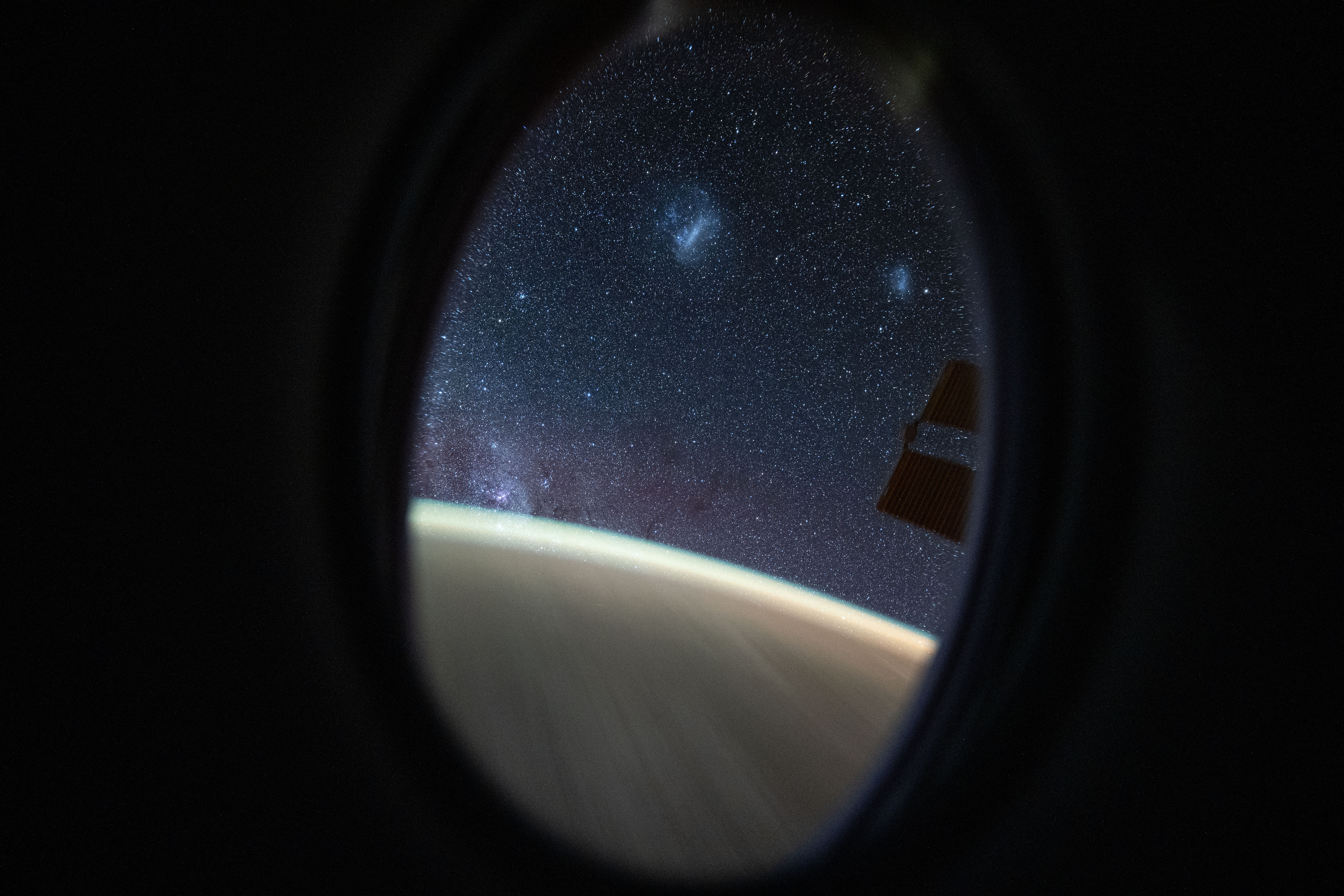 The Megallanic Clouds seen from Dragon's window