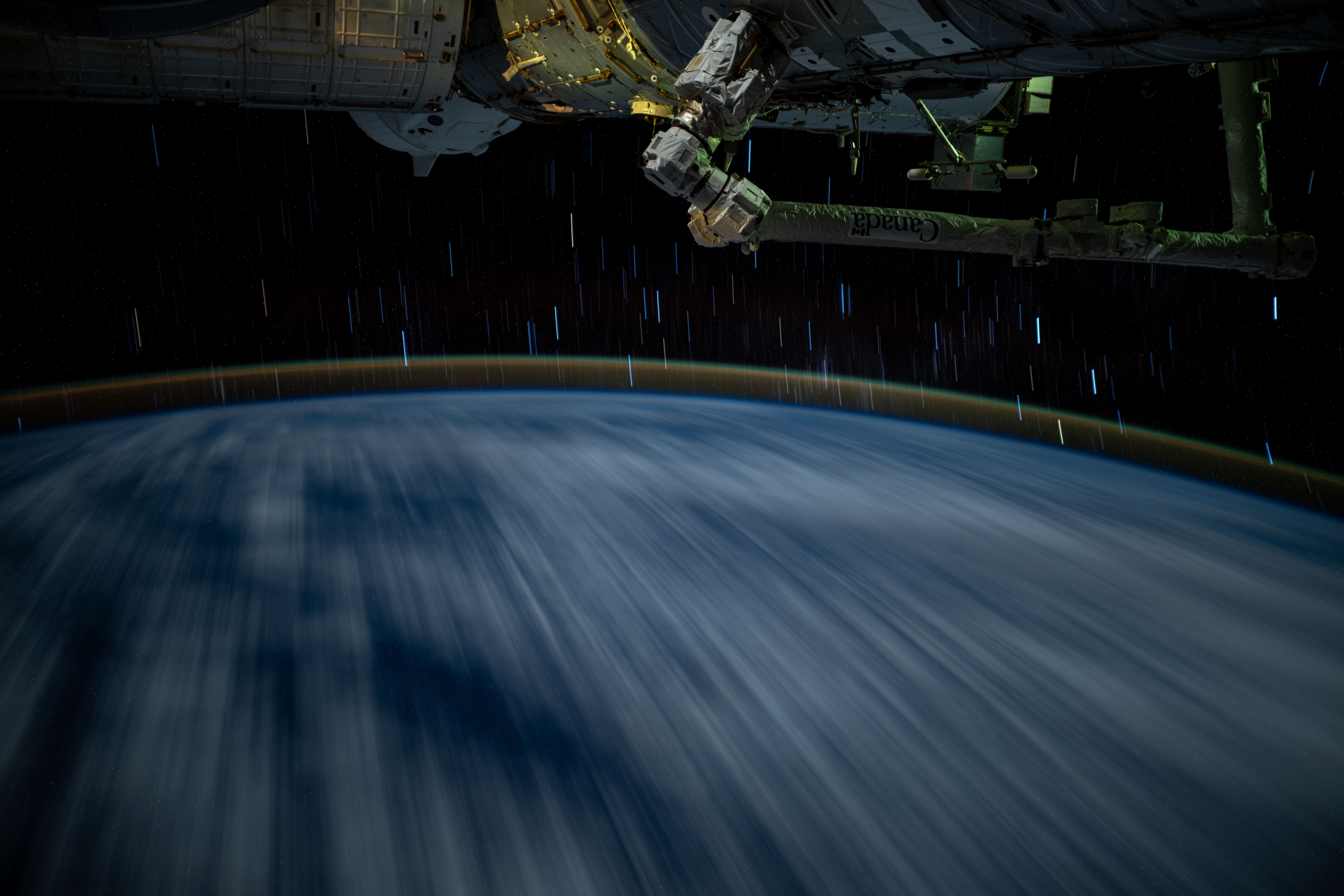 Clouds streak across the Indian Ocean beneath the International Space Station