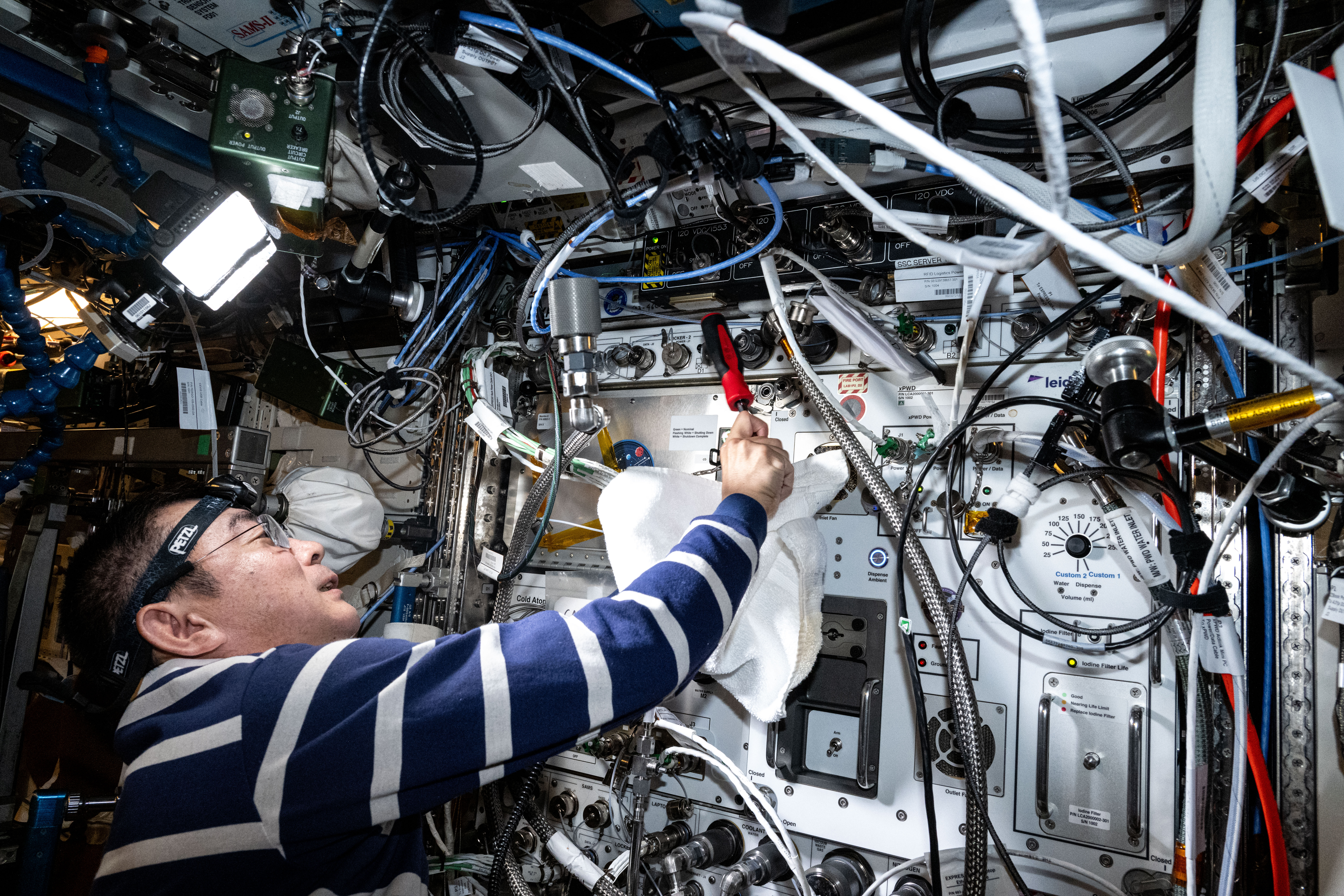 JAXA astronaut Kimiya Yui works on the Cold Atom Lab