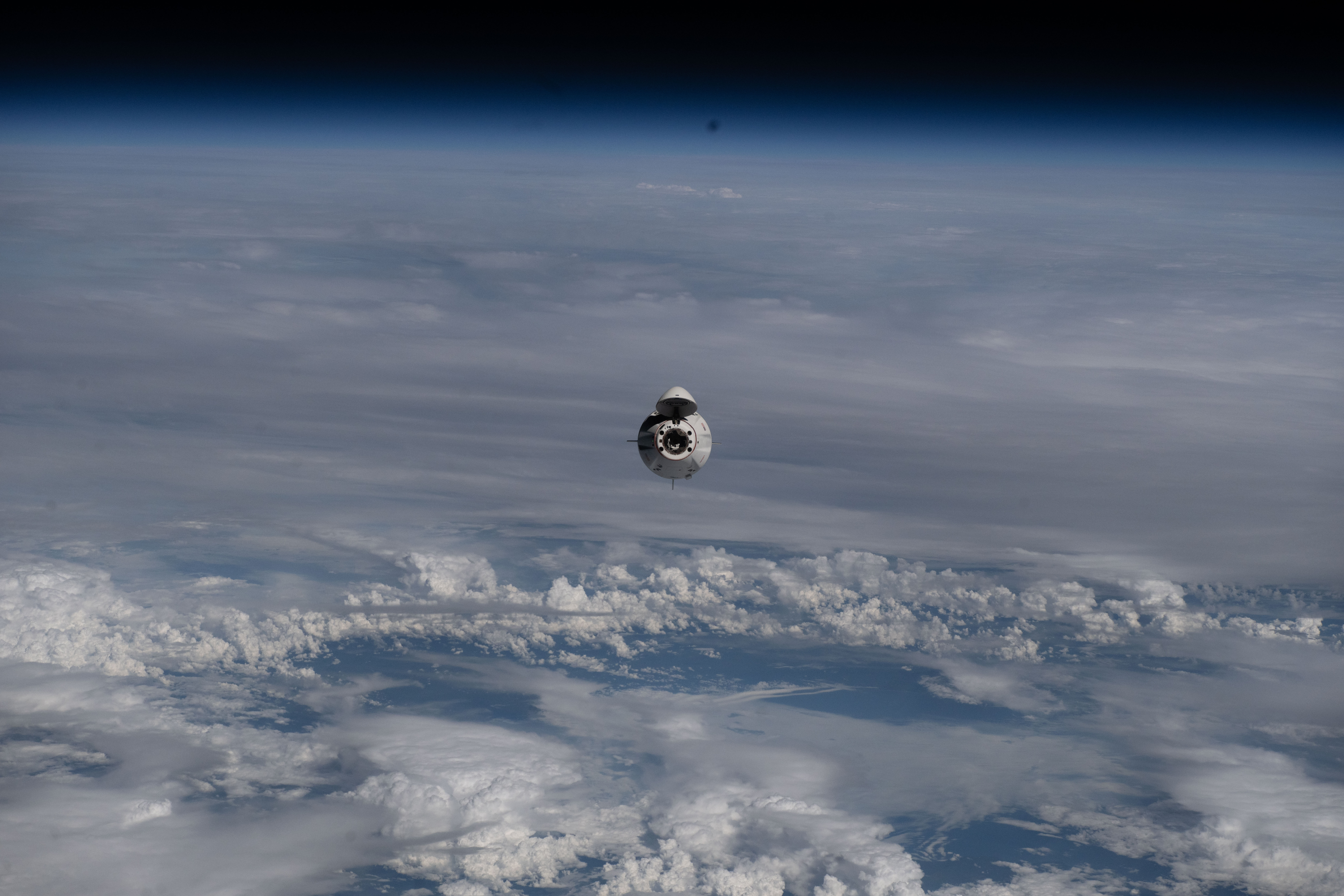 The SpaceX Dragon crew spacecraft approaches the International Space Station