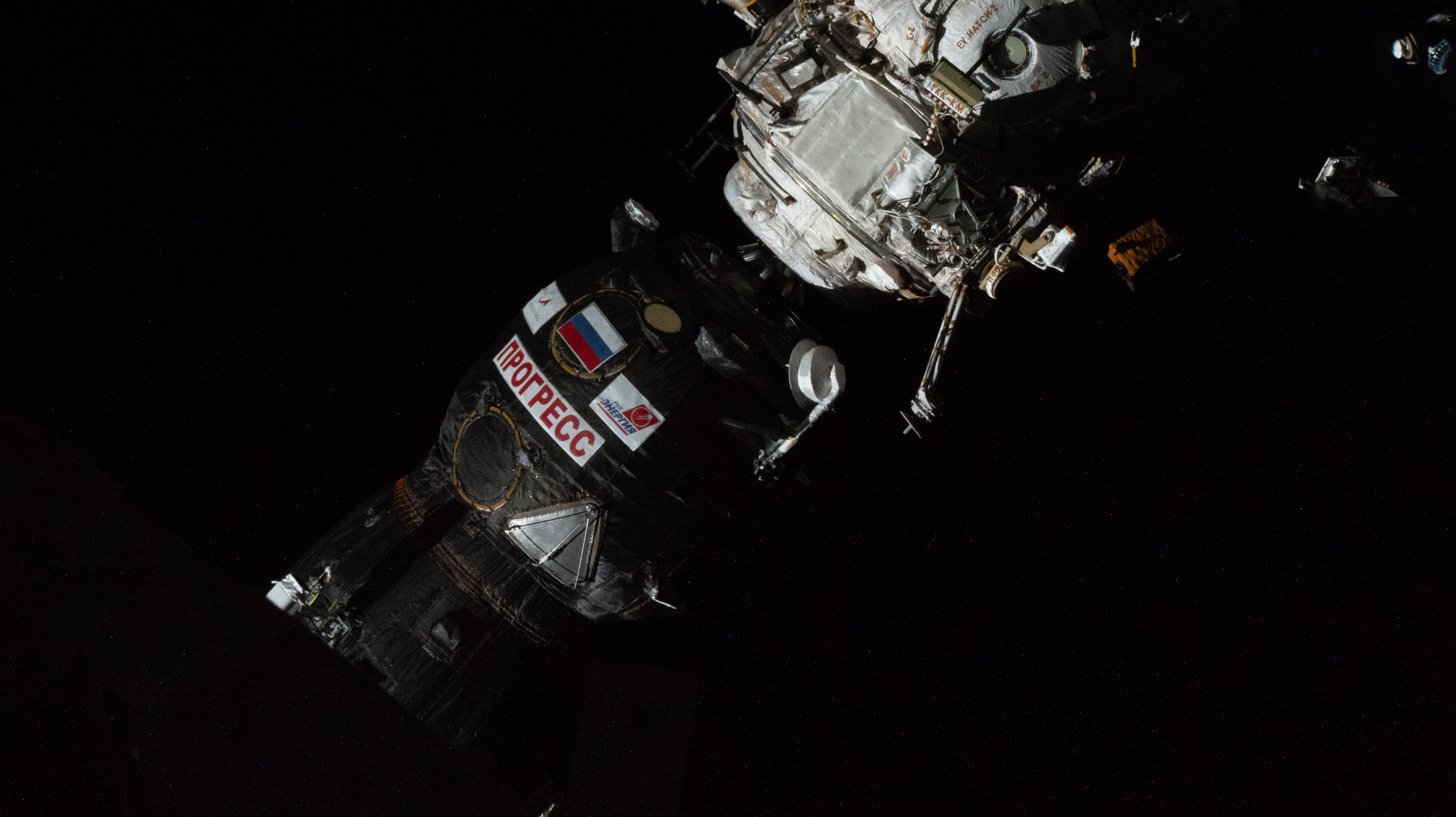 The Progress 94 cargo spacecraft is pictured docked to the International Space Station's Poisk module