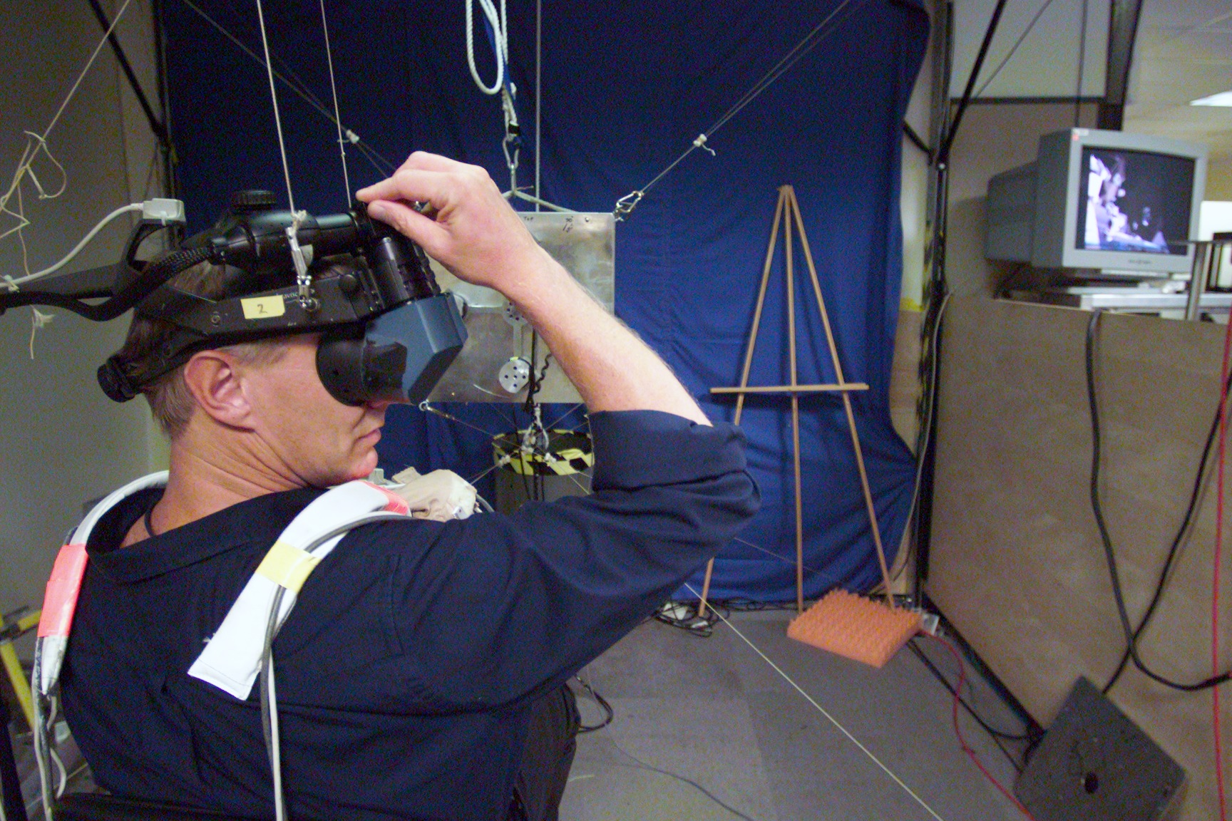 Photographic coverage of STS-112 during EVA 3 in VR Lab.